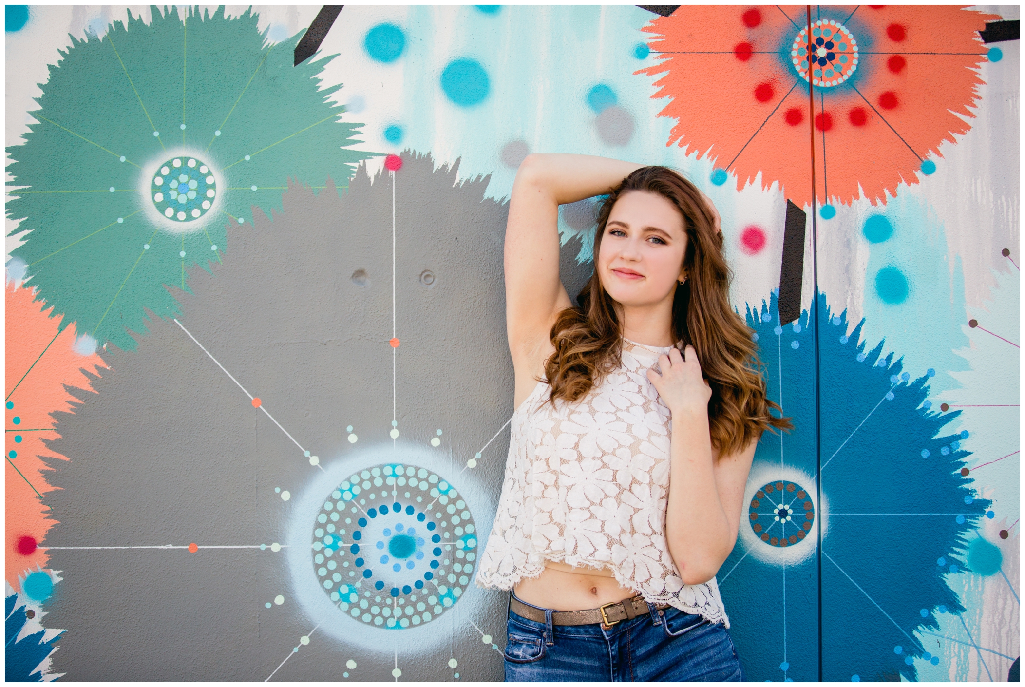 Silver Creek Colorado senior girl posing against a graffiti wall in Longmont CO 