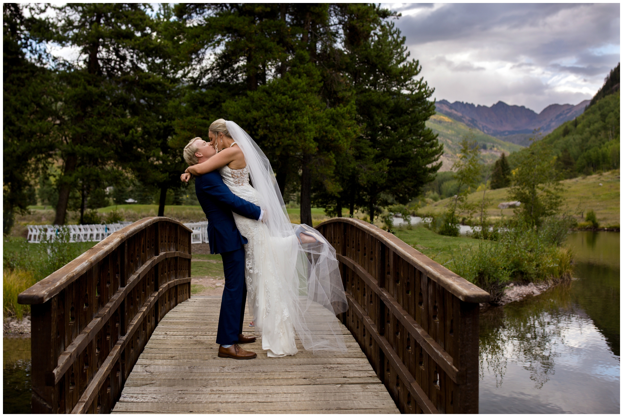 bride and groom on bridge at Vail Colorado wedding photography 