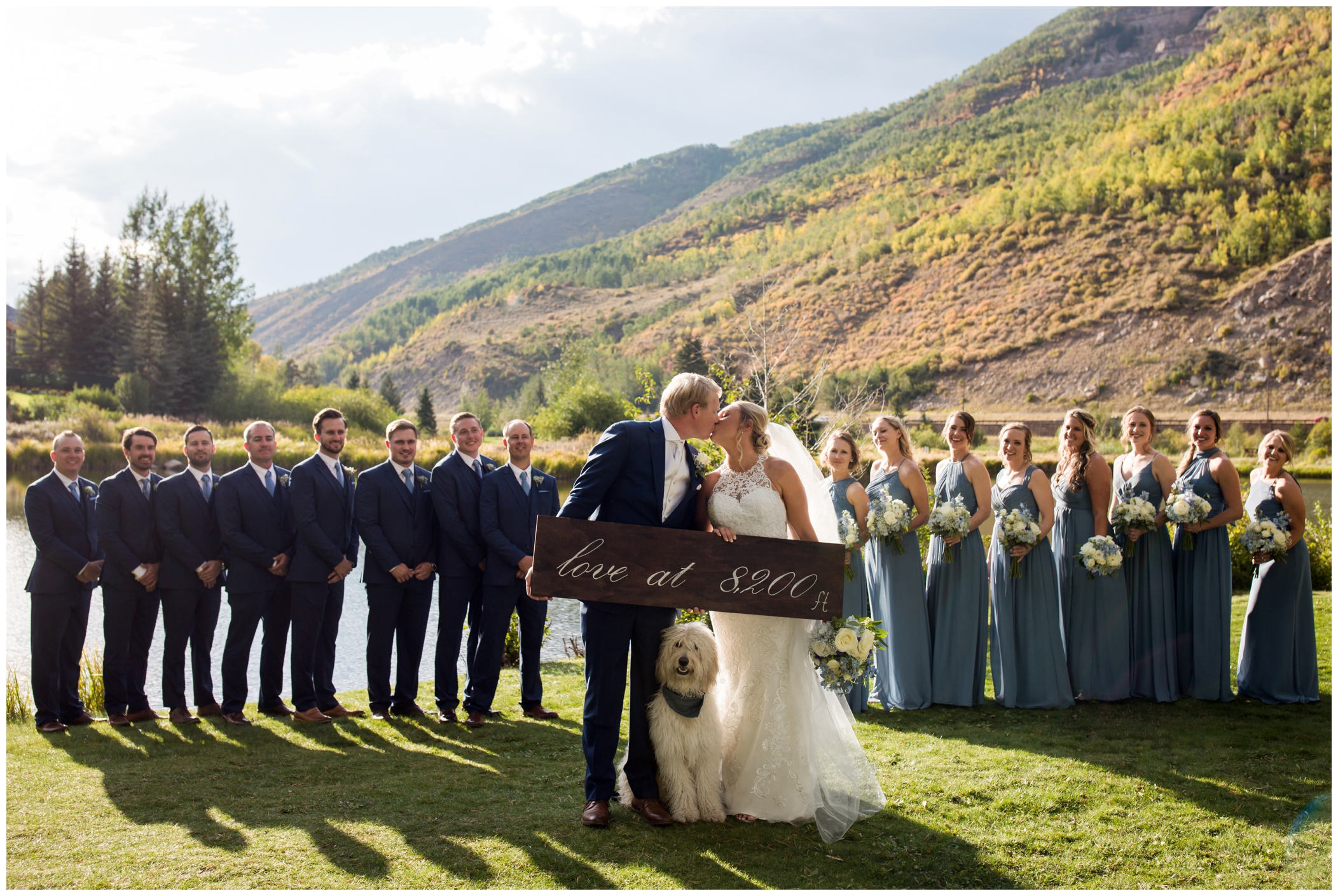 Vail Colorado bridal party posing by lake 