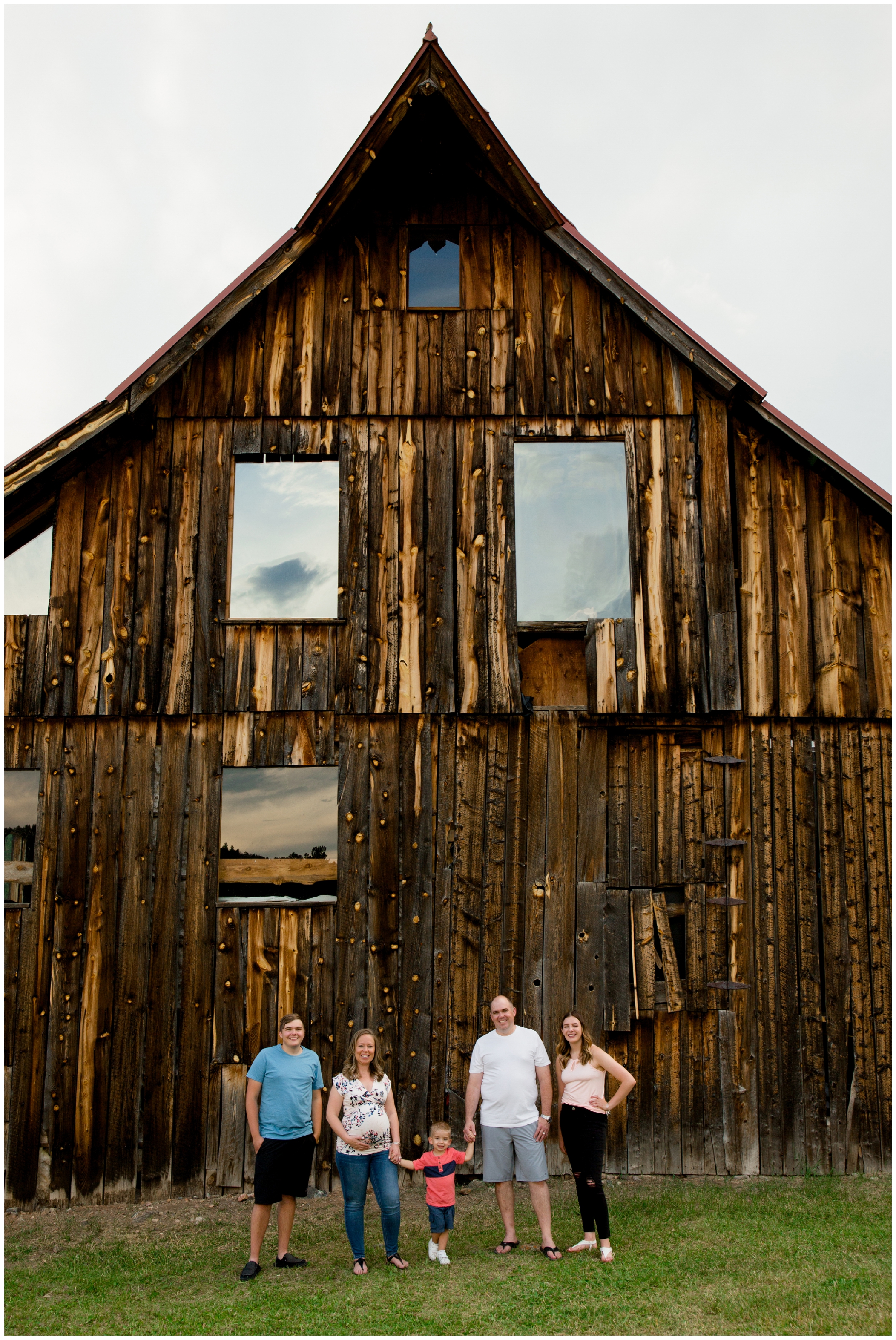 Colorado family maternity photos with rustic barn in background