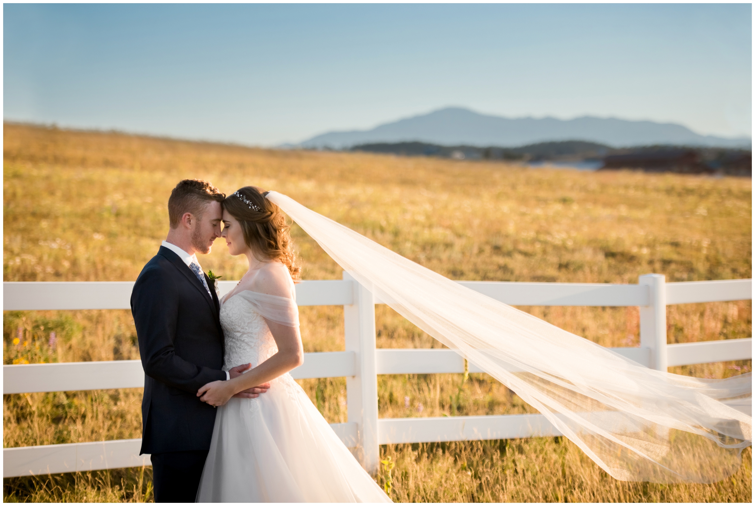 Colorado ranch wedding portraits with mountains in the background