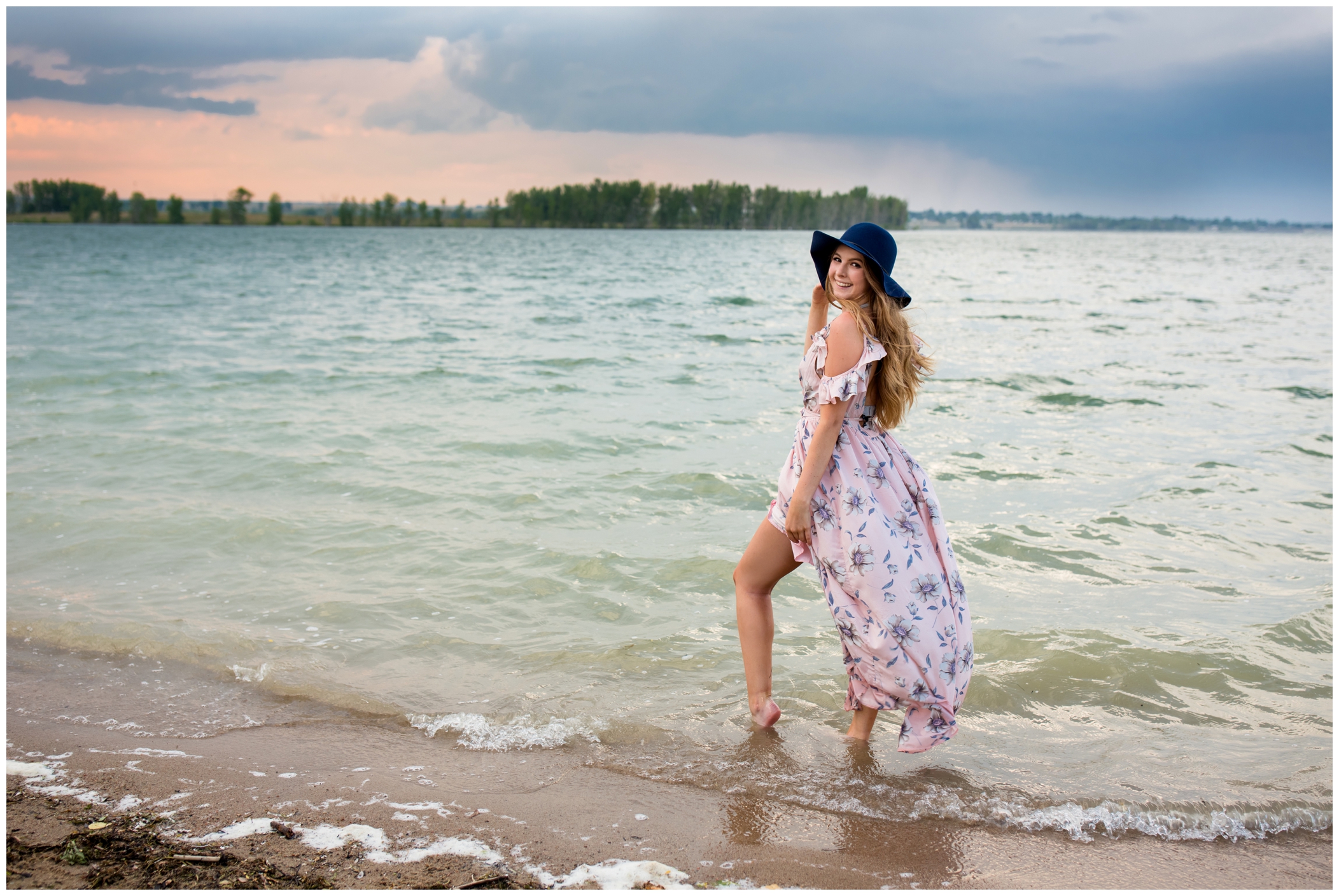 girl standing on the beach at Standley Lake Westminster senior pictures