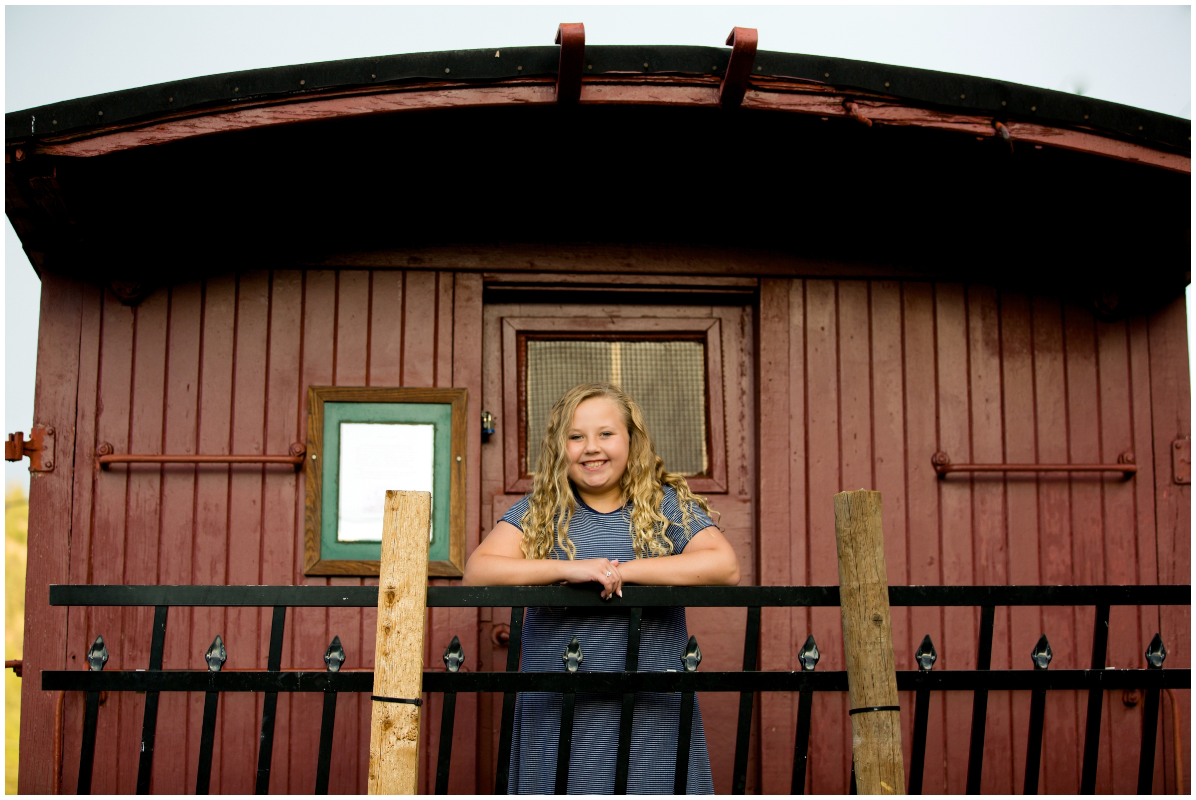 young girl on train car at Bailey Colorado family photography session 