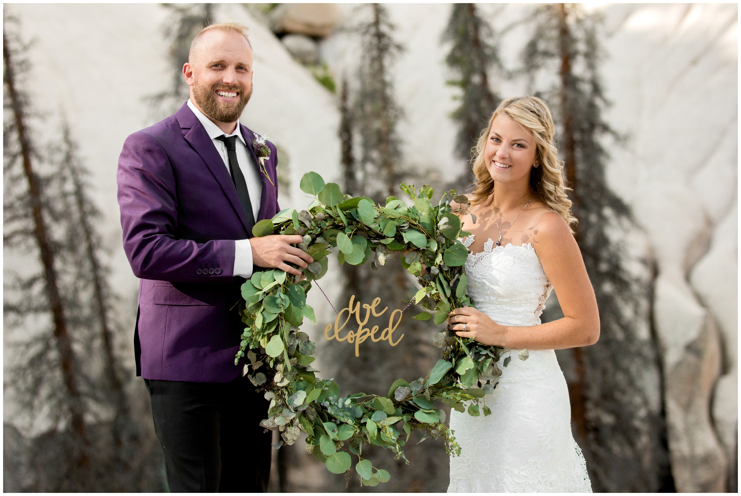 couple holding eucalyptus wreath at Creede Colorado mountain elopement wedding 