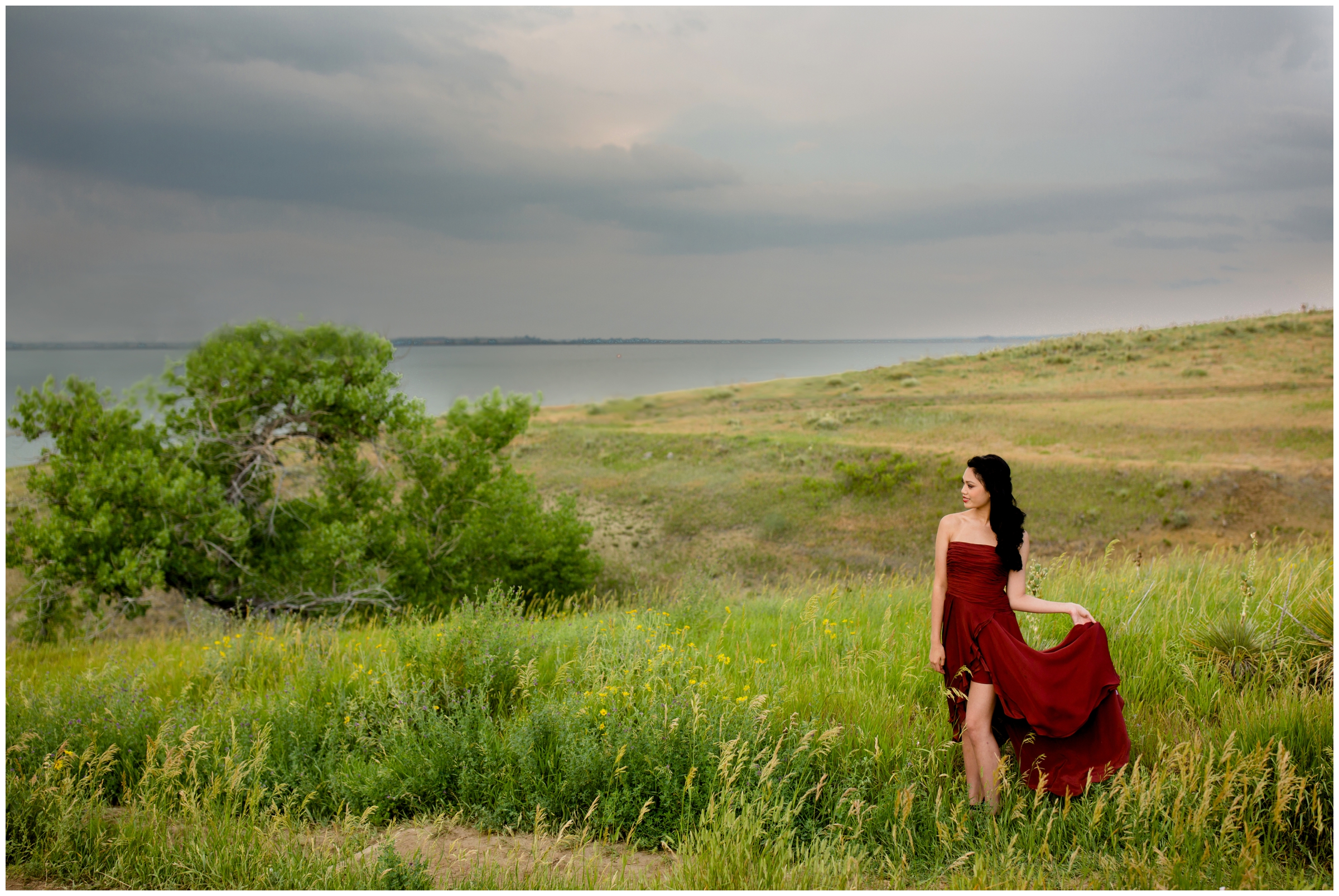 dramatic sky during Westminster Colorado senior portrait photography session at Standley Lake 