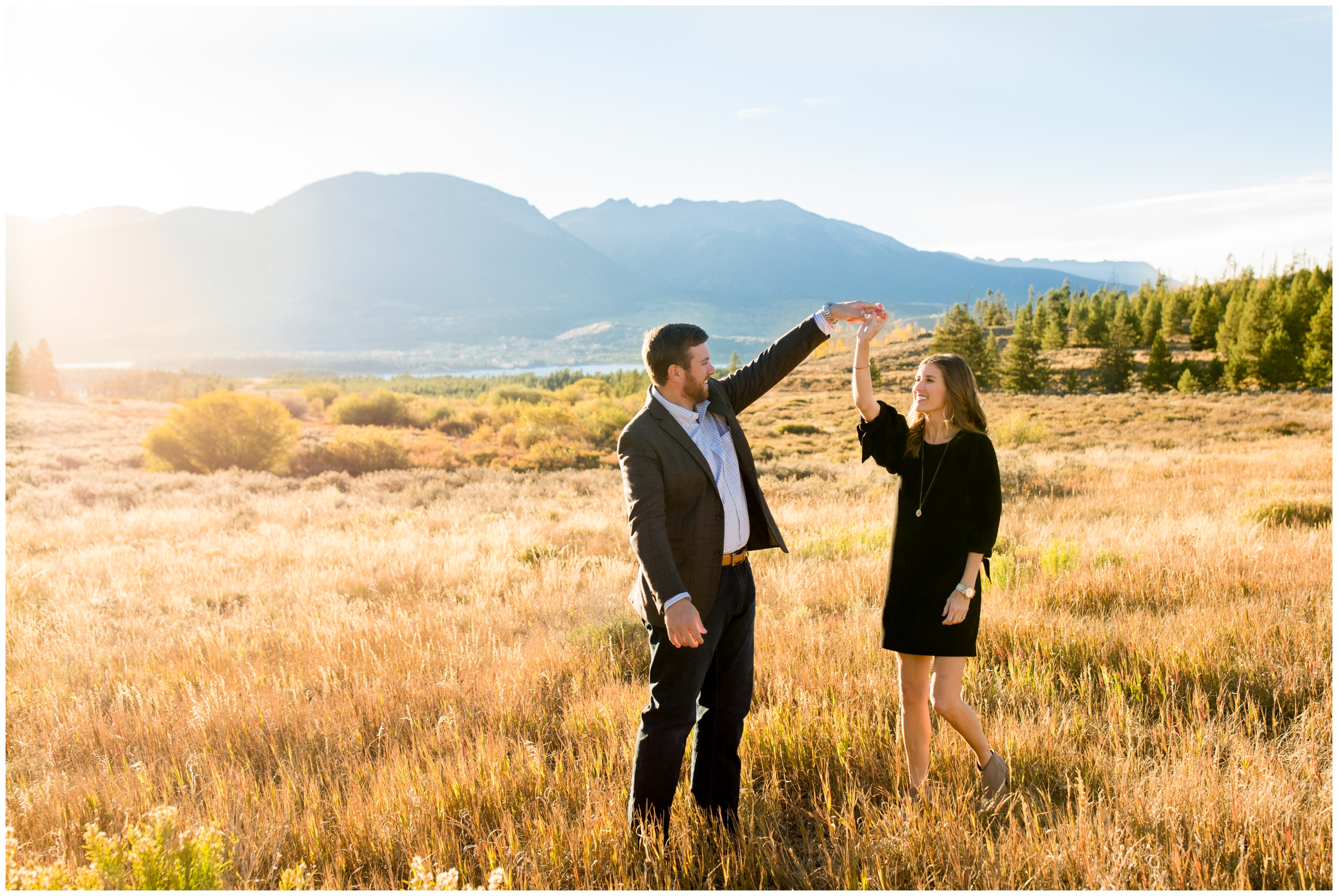 couple dancing with mountains in background at Windy Point Campground Breckenridge Colorado engagement portraits