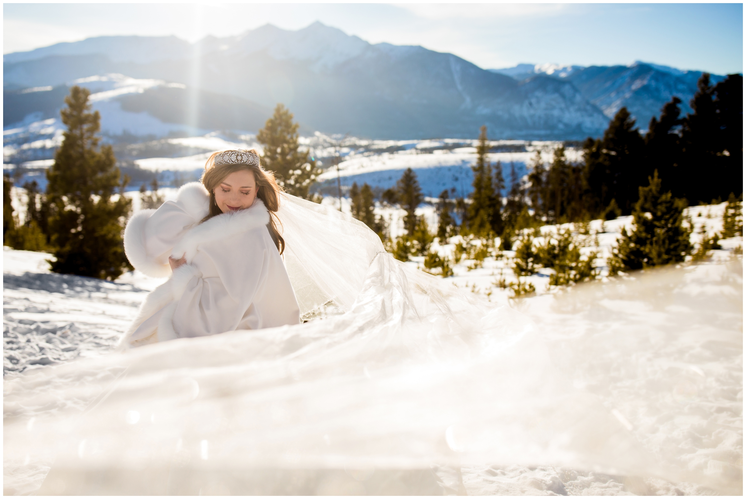 colorado winter bride with long cathedral veil at Sapphire Point wedding 