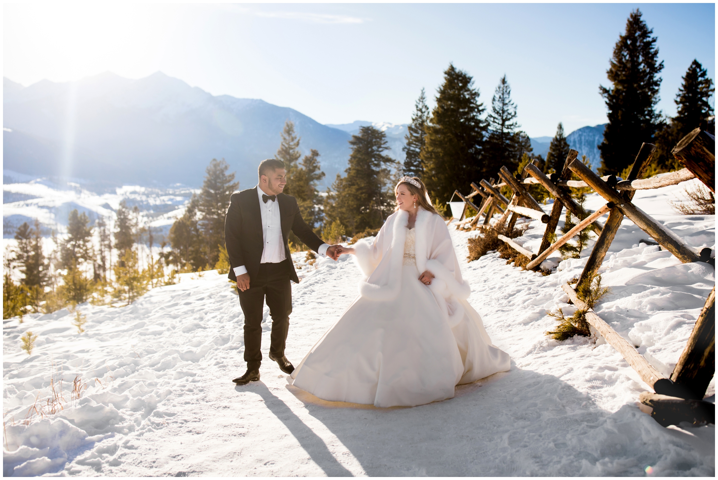 couple walking in snow at Sapphire Point wedding photos in Breckenridge Colorado 