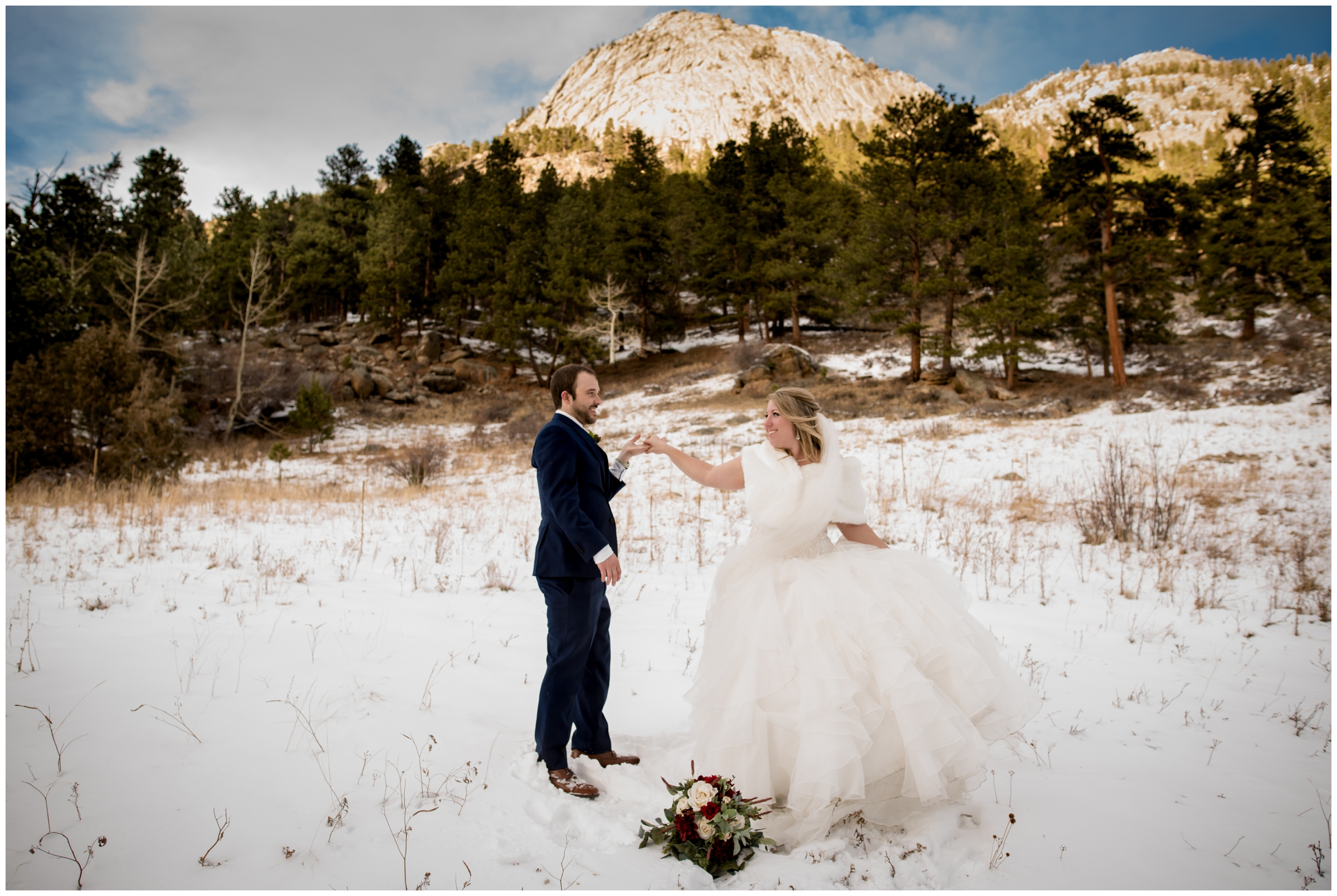 bride and groom dancing in the snow at Della Terra Mountain Chateau wedding photography session 