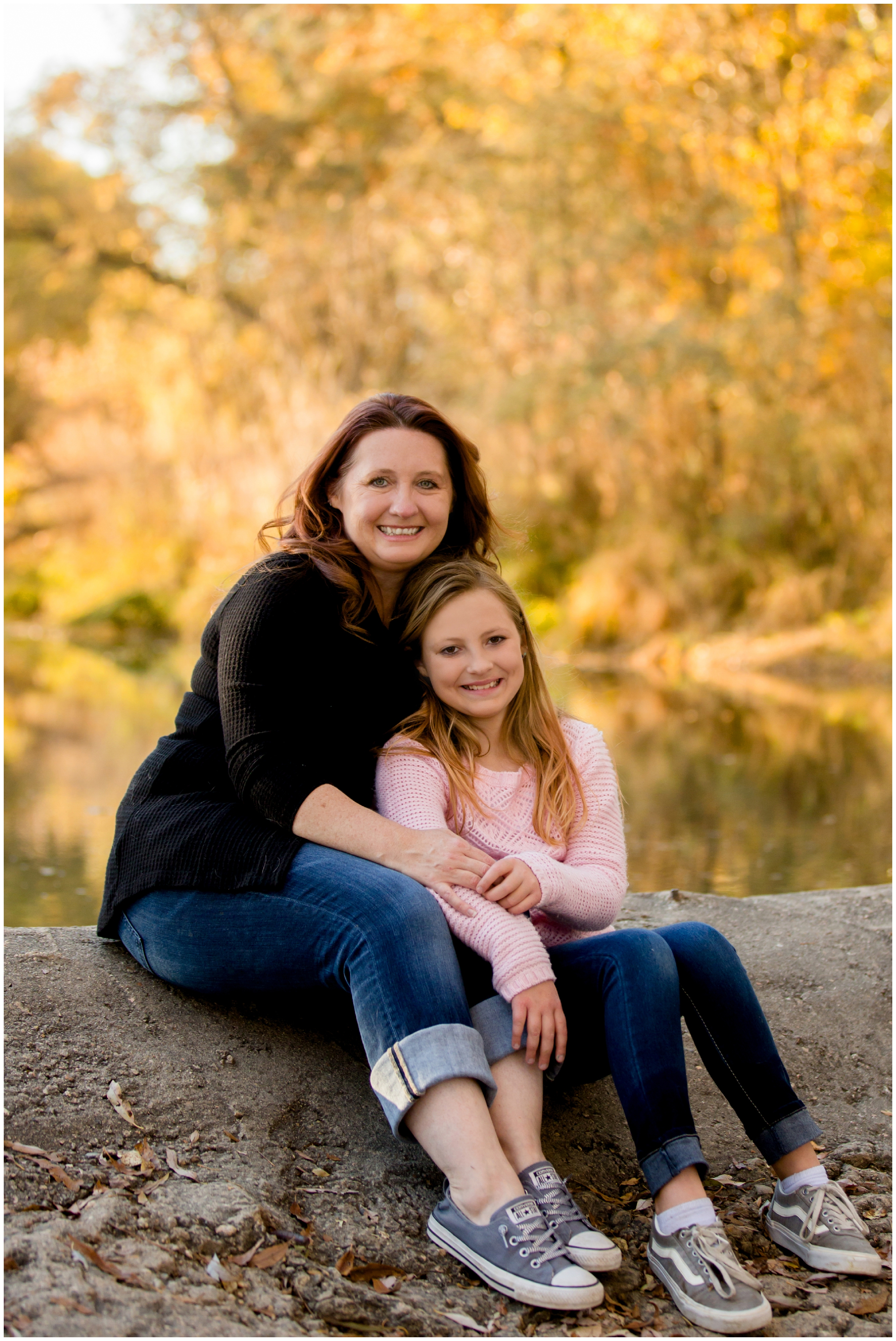 mom and daughter with fall foliage at Longmont Colorado family pictures