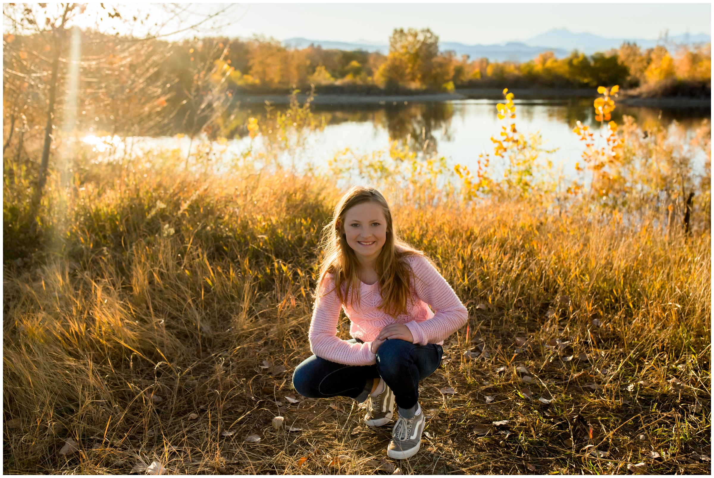 girl posing by lake at Longmont Colorado family photography session 