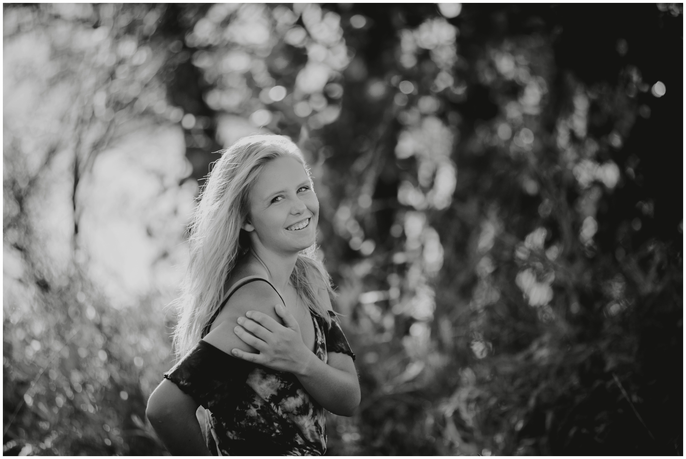 Lyons summer portraits by Longmont Colorado senior photographer Plum Pretty Photography. Lake senior pictures inspiration at Mcintosh Lake and Hall Ranch.