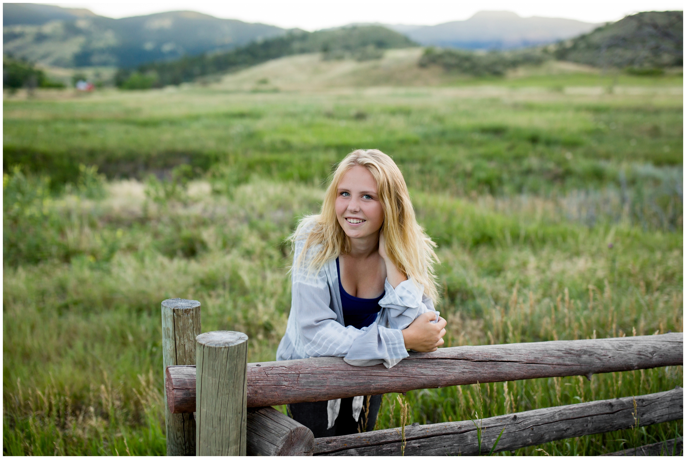 girl posing on fence at Hall Ranch Open Space Lyons