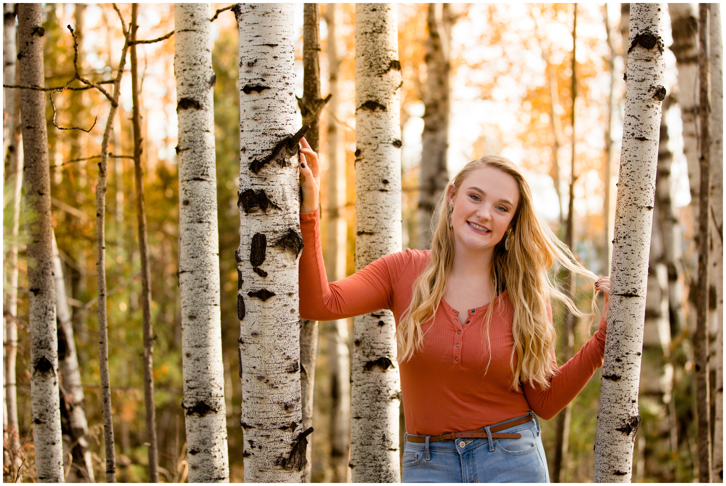 Boulder Colorado mountain senior pictures with fall foliage in background 