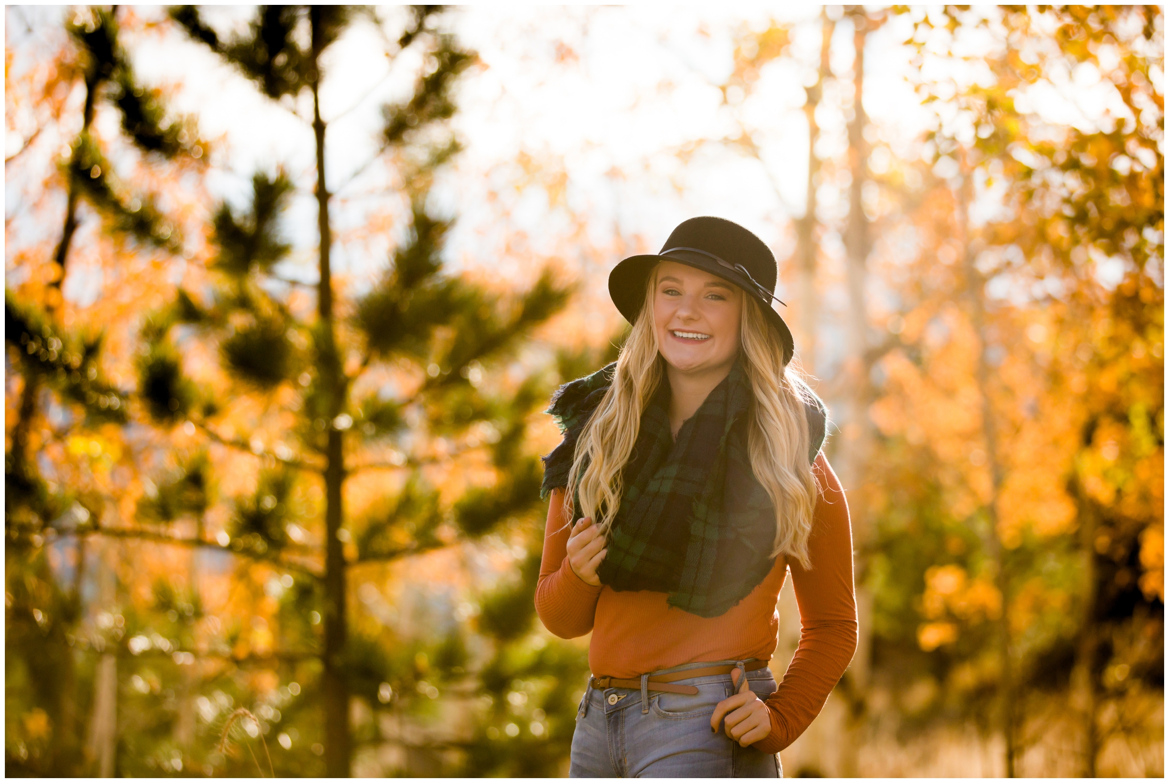 Berthoud High School senior photography inspiration with fall foliage in background