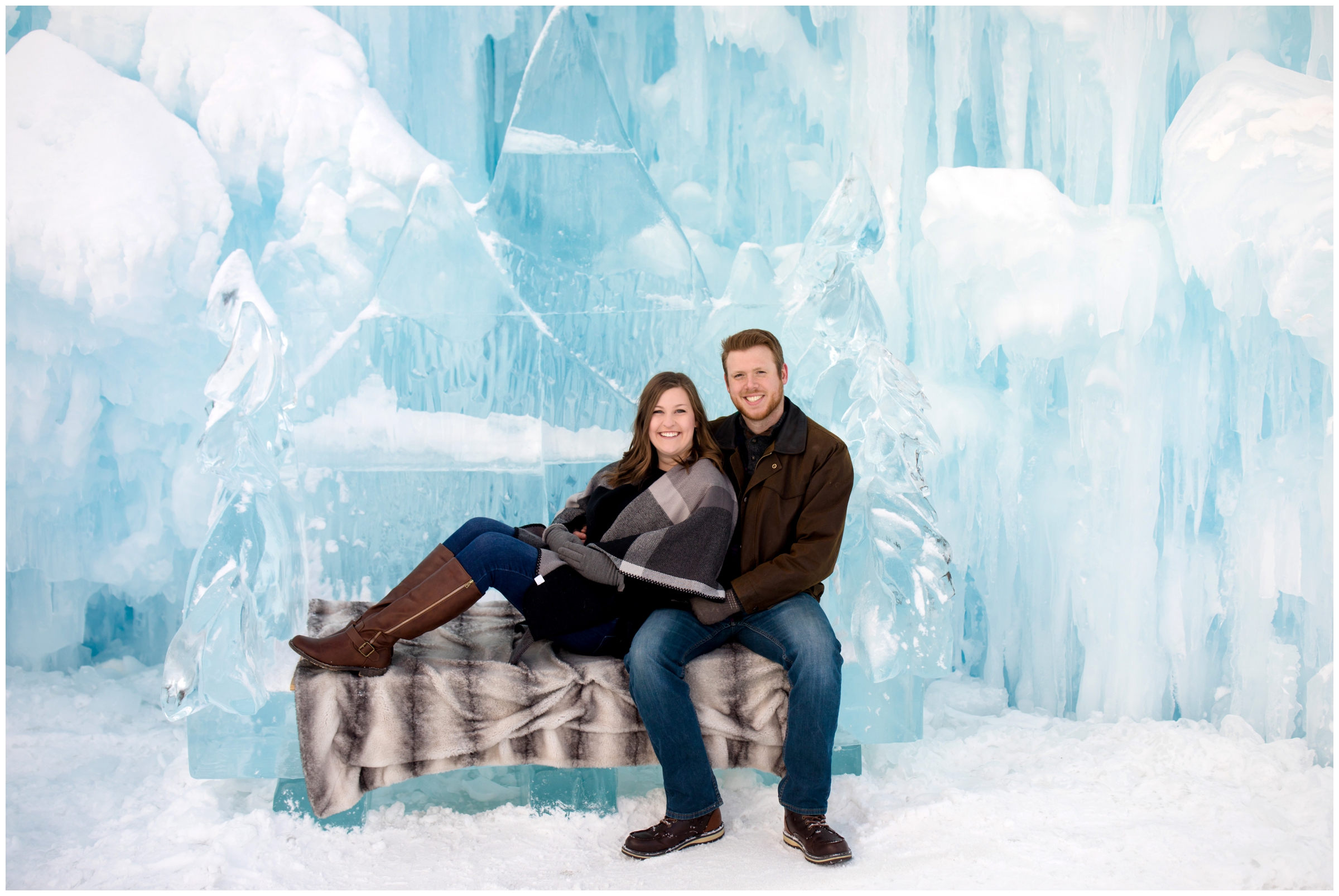 couple posing on bench made out of ice at Dillon Colorado Ice Castles 