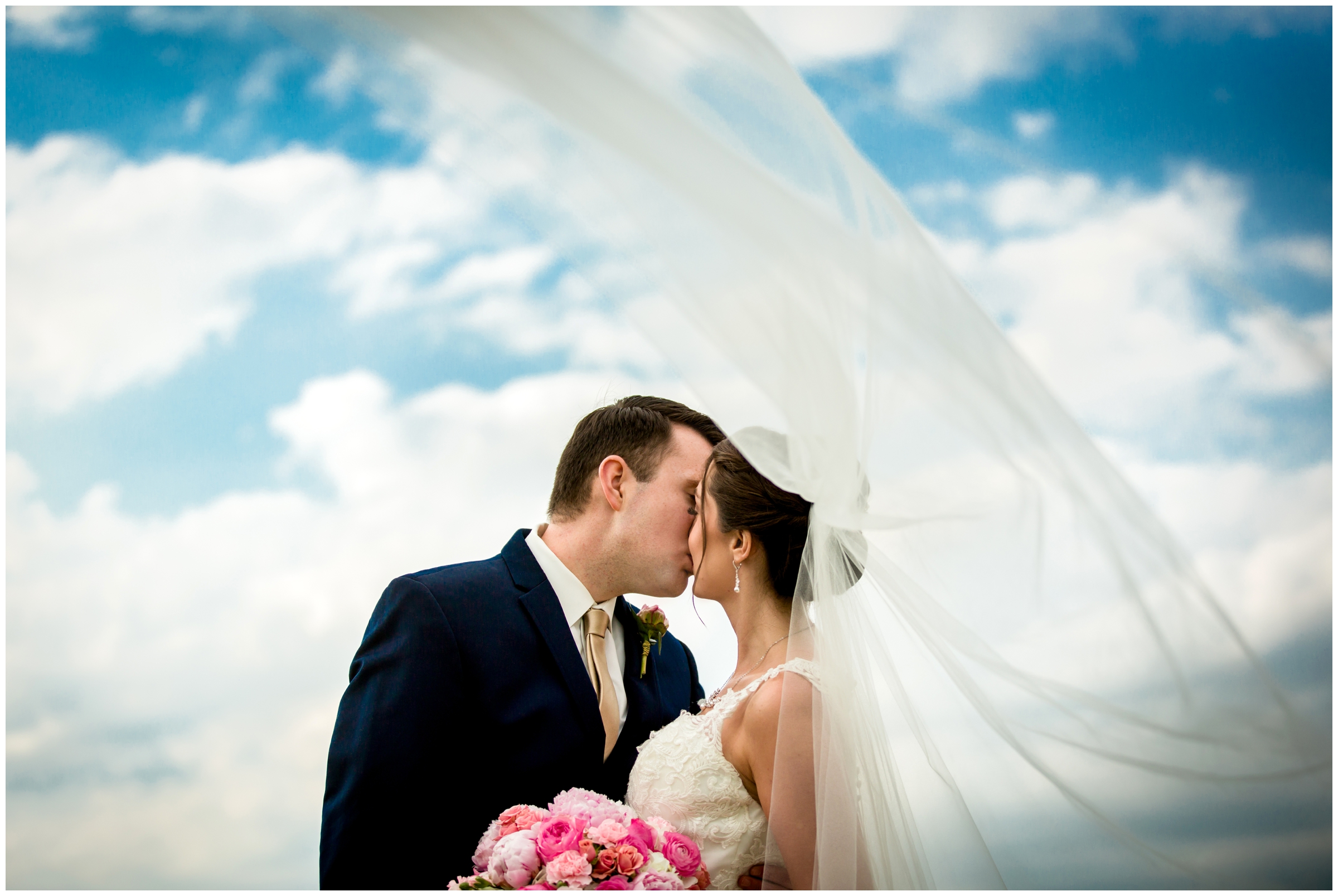 dramatic veil picture at Colorado national golf club wedding by Estes Park Photographer Plum Pretty Photography