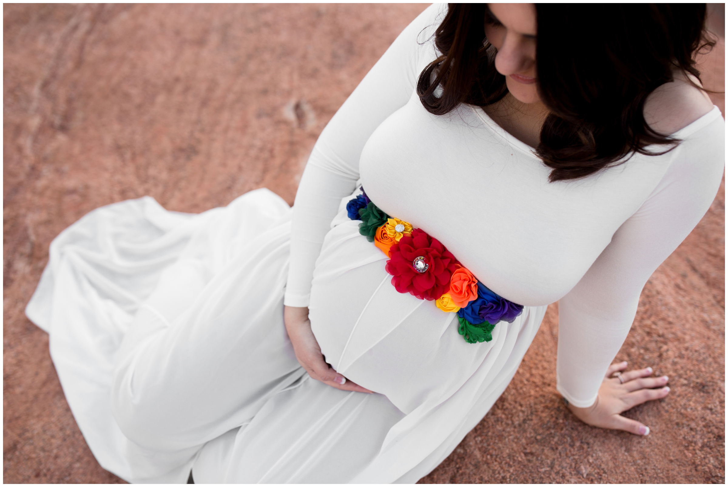 pregnant women with rainbow sash at Colorado Springs maternity photo shoot 