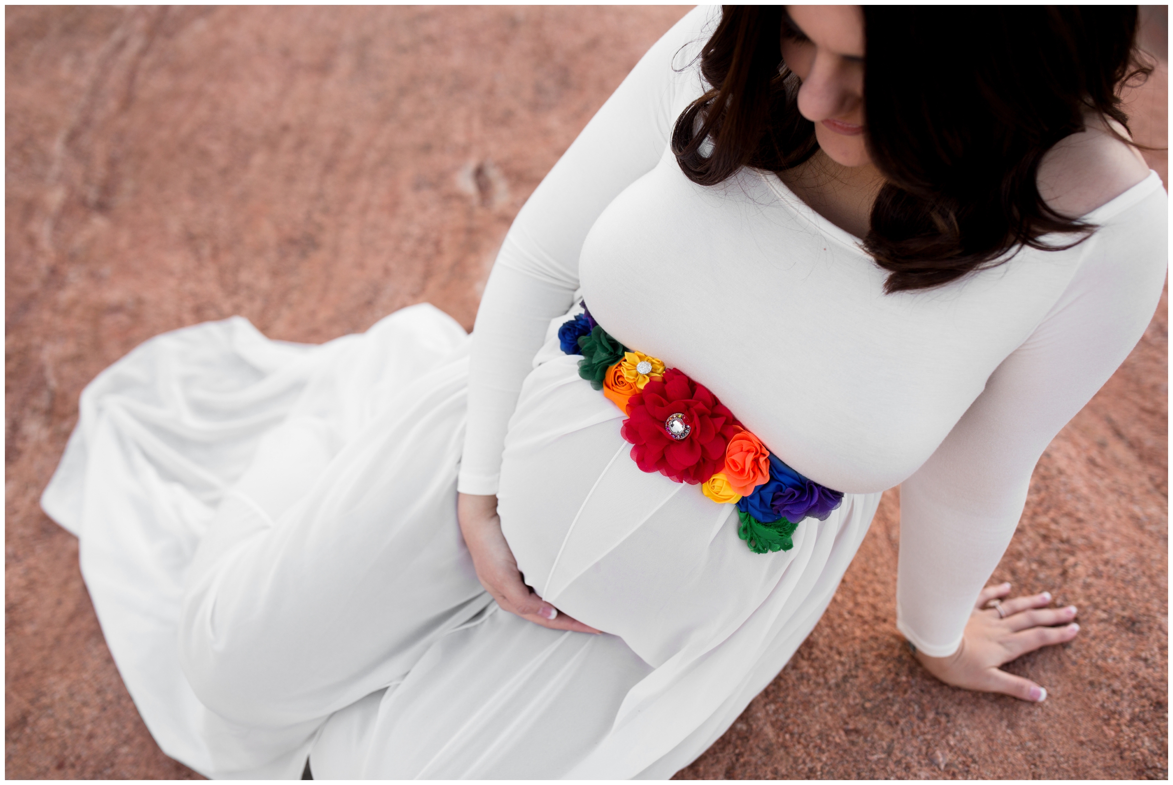 pregnant women with rainbow sash at Colorado Springs maternity photo shoot