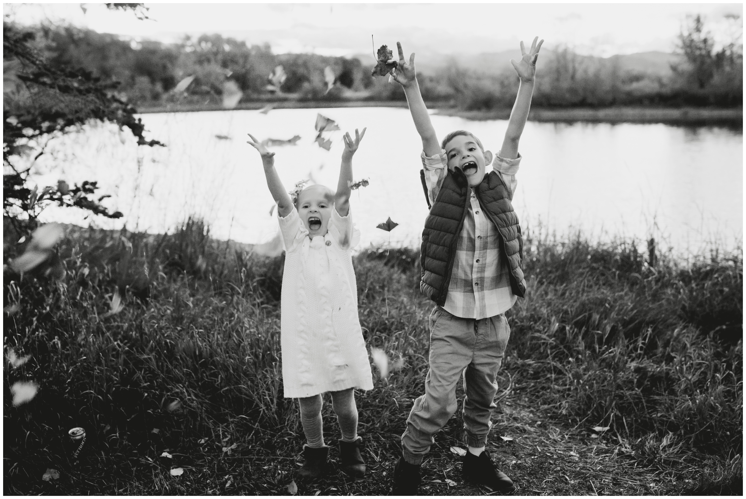 kids throwing leaves during Longmont Colorado family photos