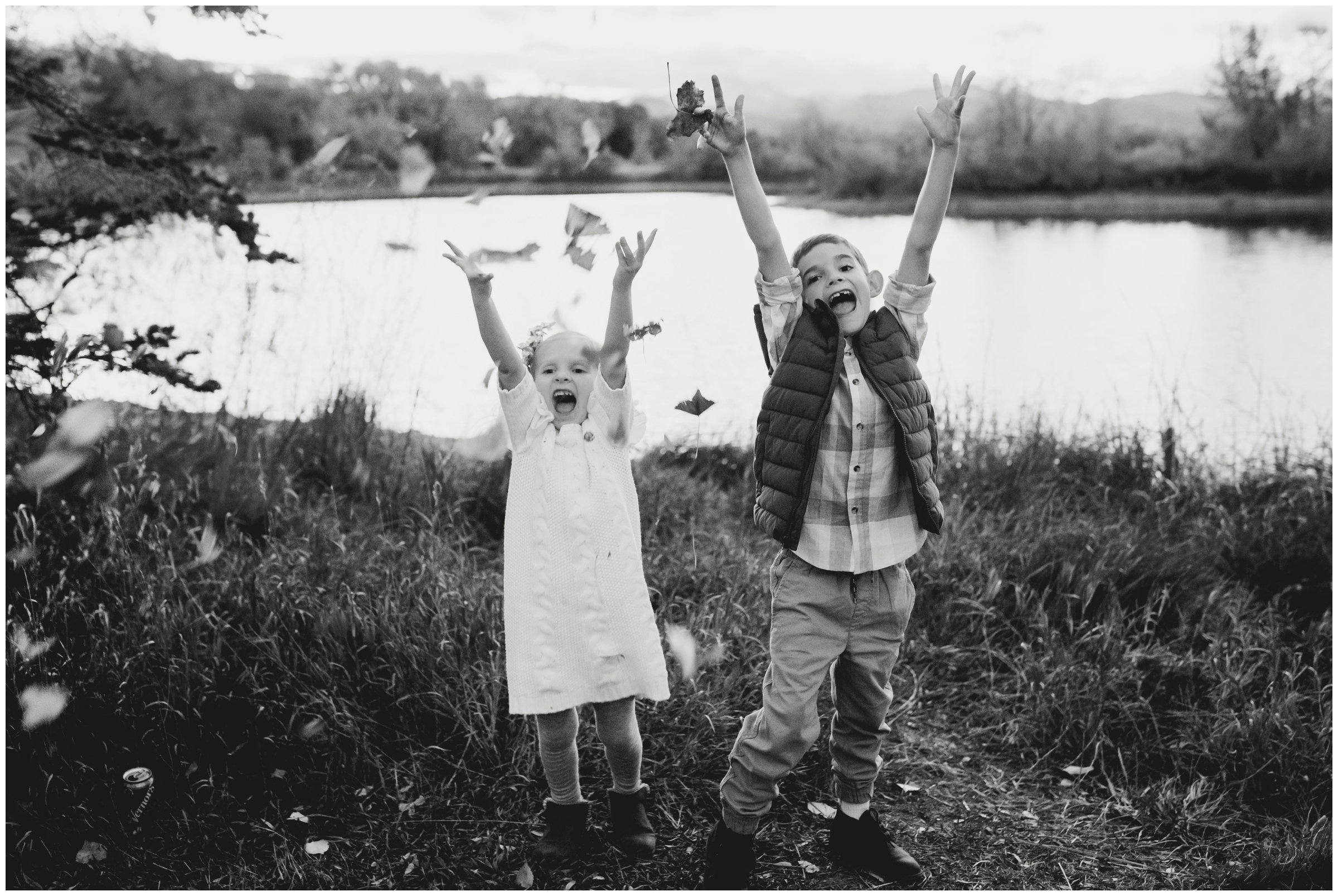 kids throwing leaves during Longmont Colorado family photos 