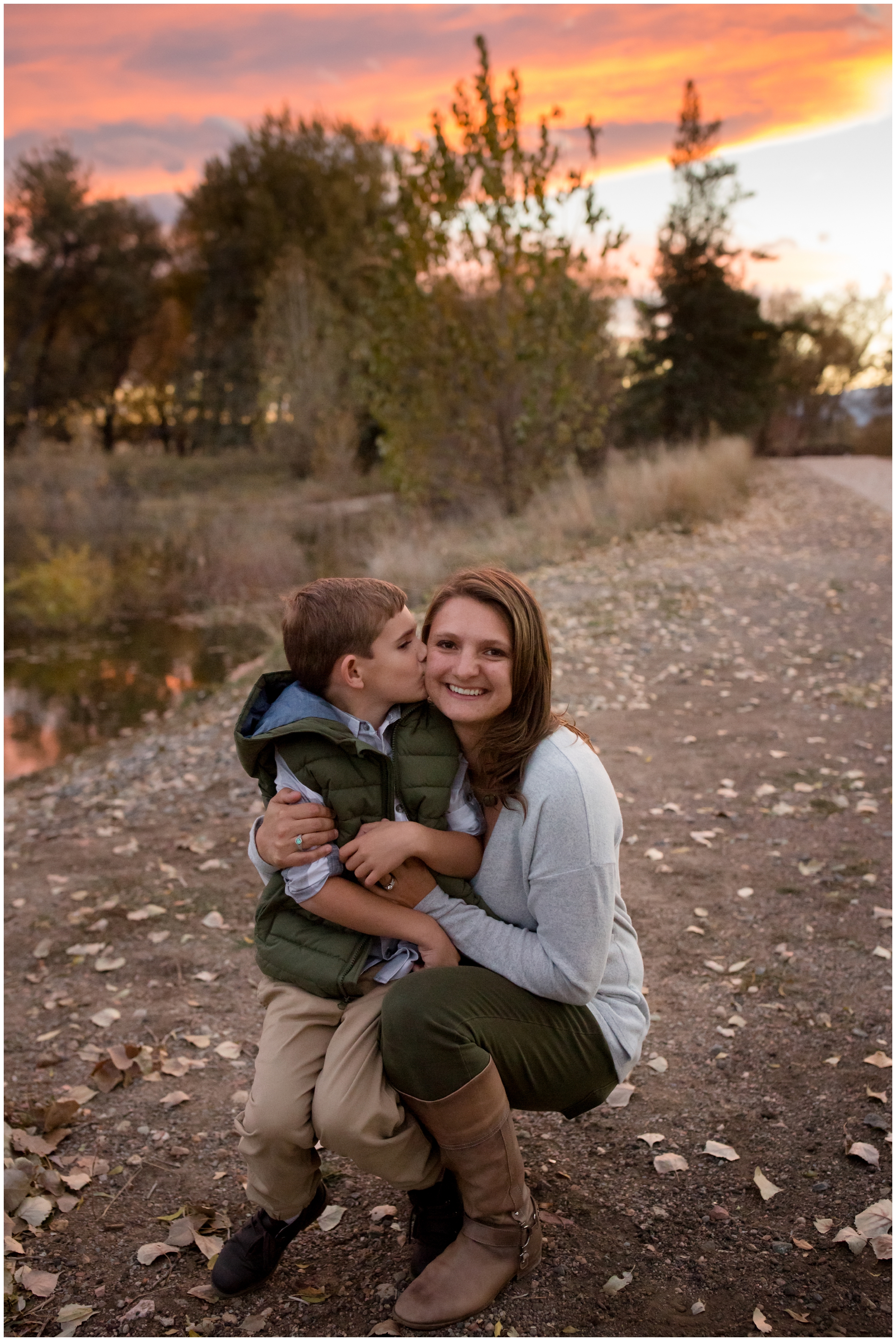 boy kissing mom during sunset Longmont Colorado family photography session