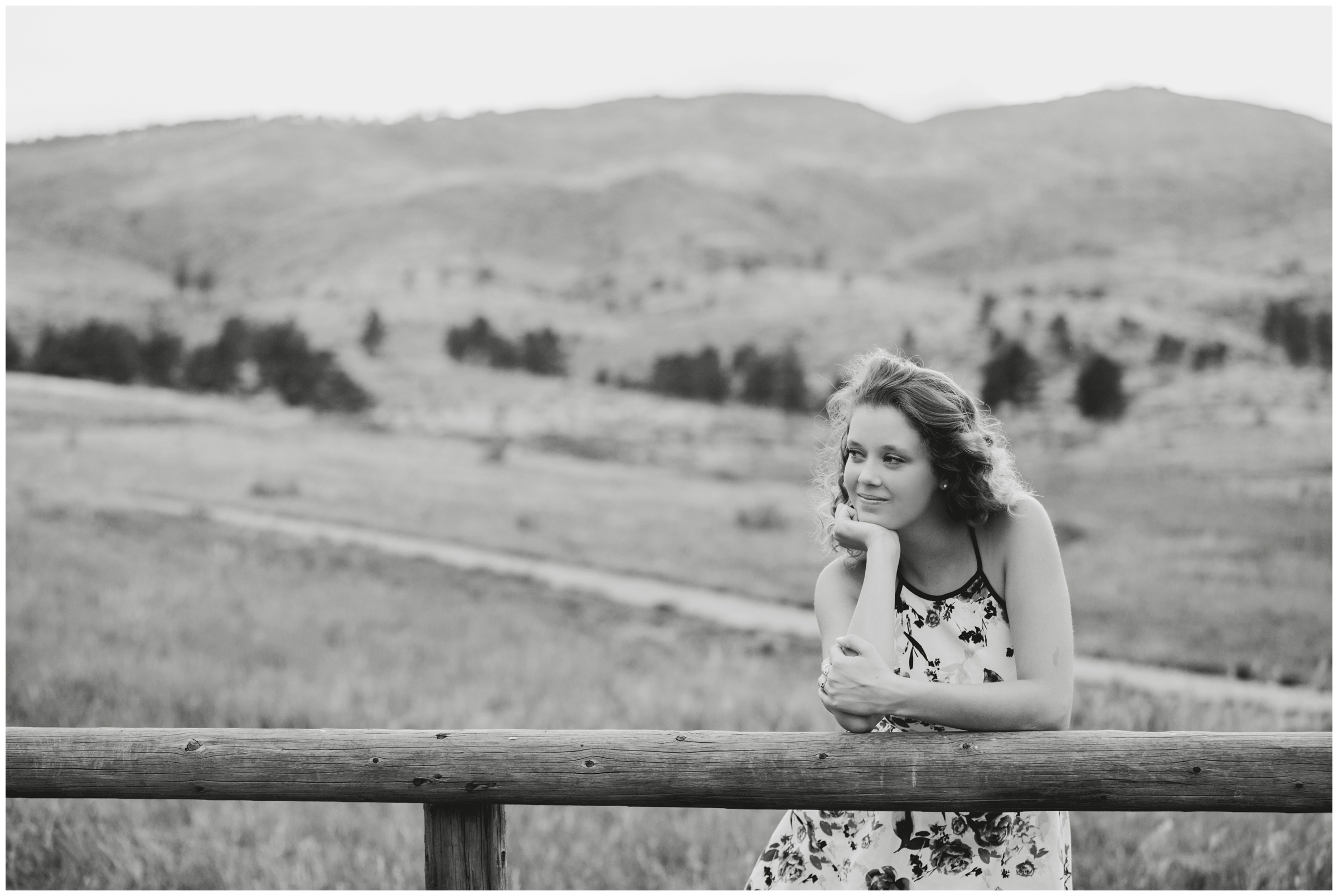 rustic senior portraits with mountains in background in Loveland Colorado 
