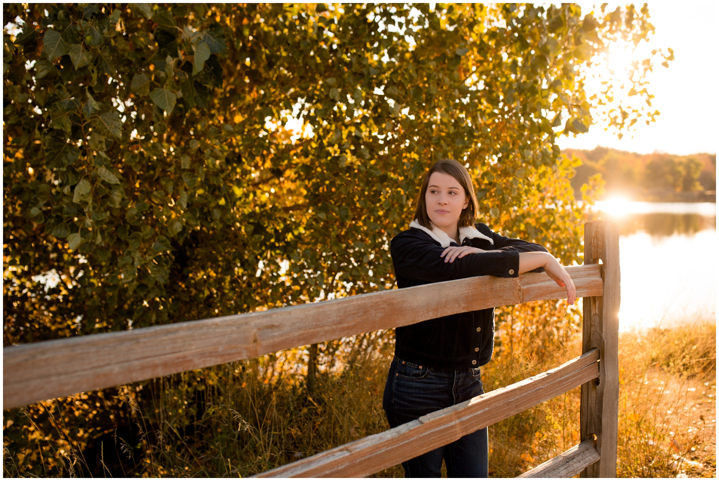 Golden Ponds Nature Area Longmont Colorado senior pictures with fall foliage in background 