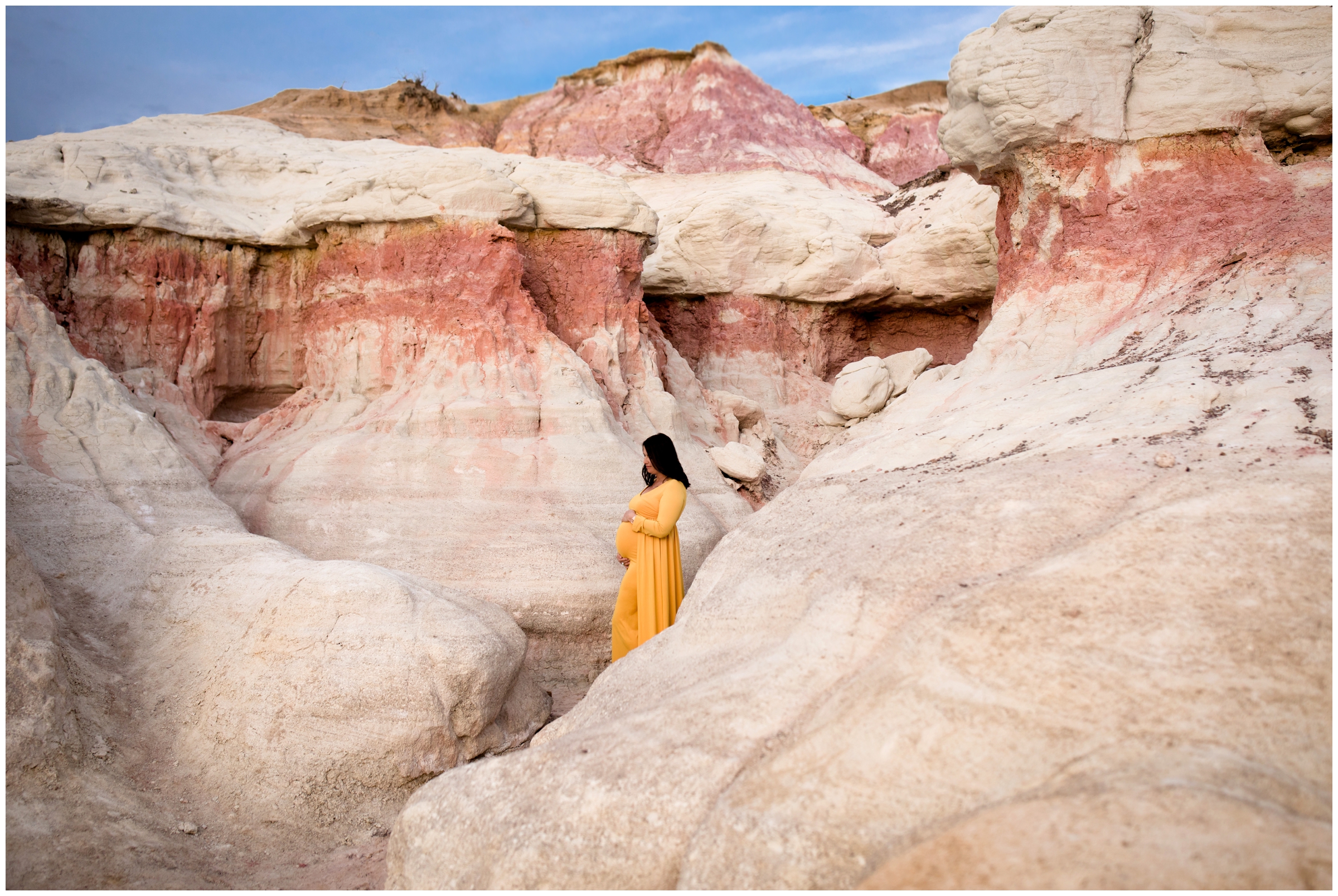 Colorado Springs maternity photos at the Calhan Paint Mines by portrait photographer Plum Pretty Photography