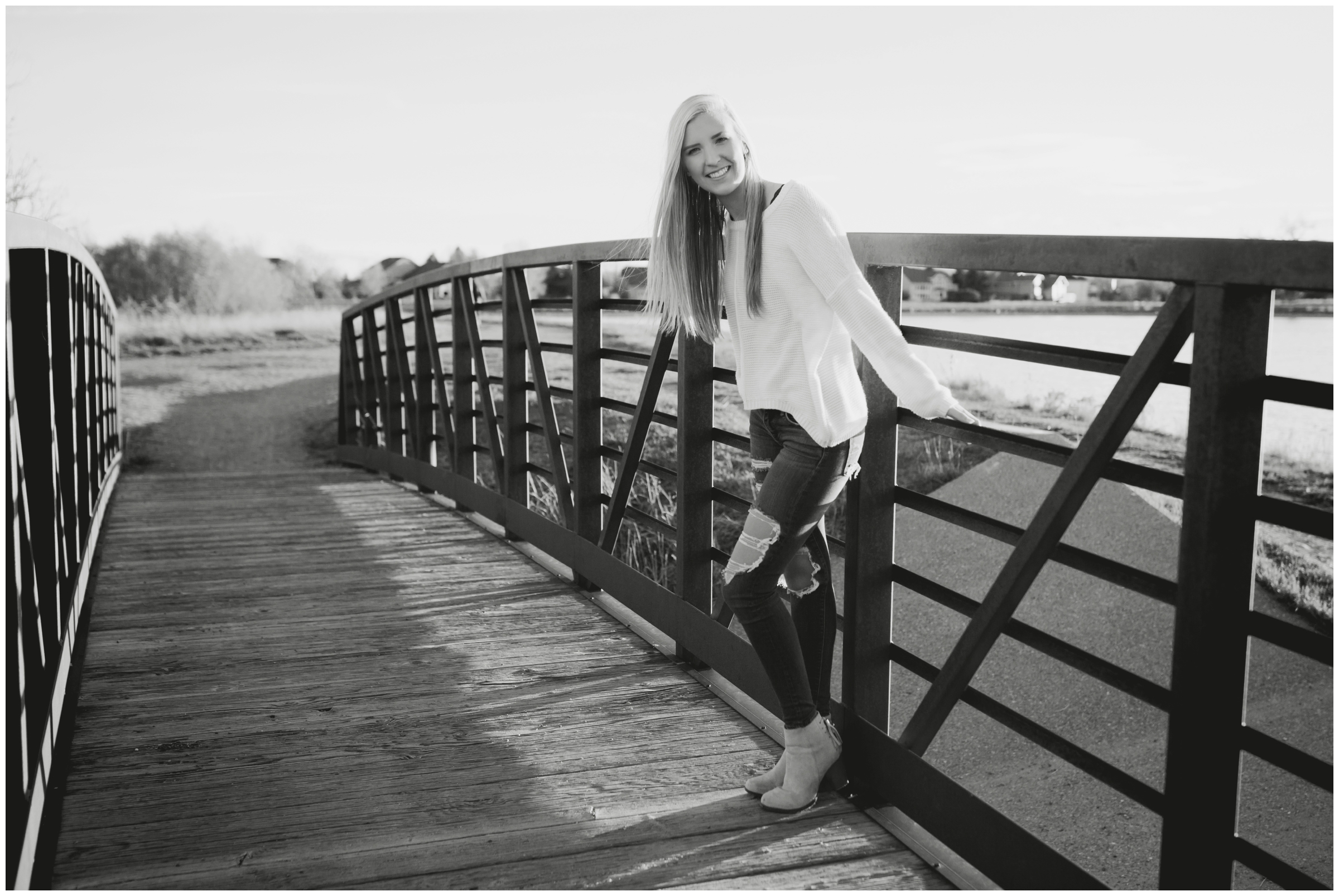 teen girl posing on metal bridge during Boulder Colorado fall senior photos 