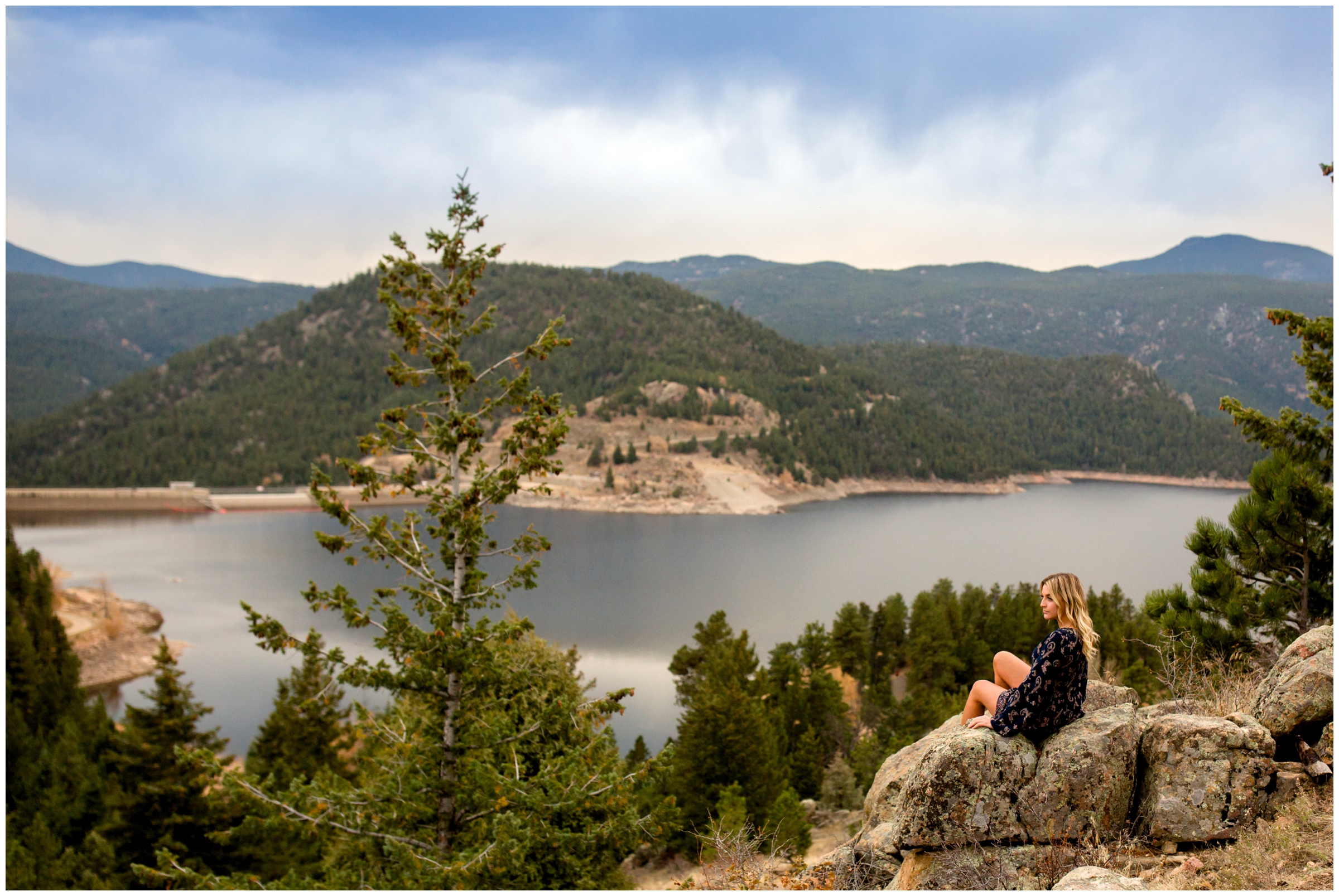 girl sitting on rock formations overlooking Gross Reservoir Boulder 