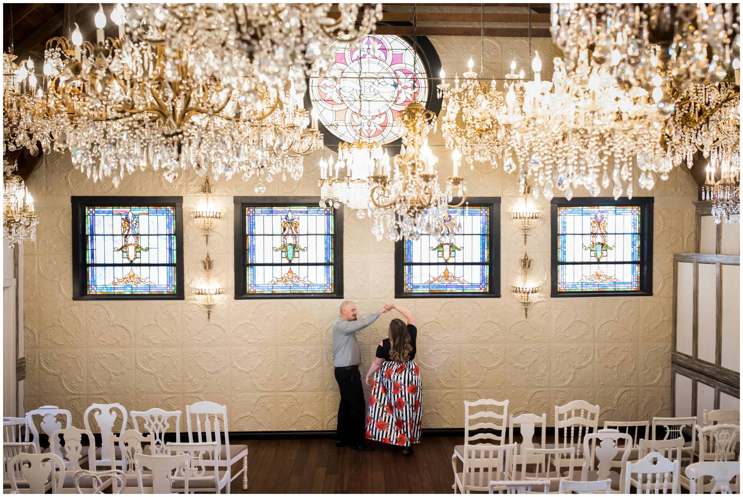 couple dancing under chandeliers at Colorado Lionsgate Event Center elopement photos 
