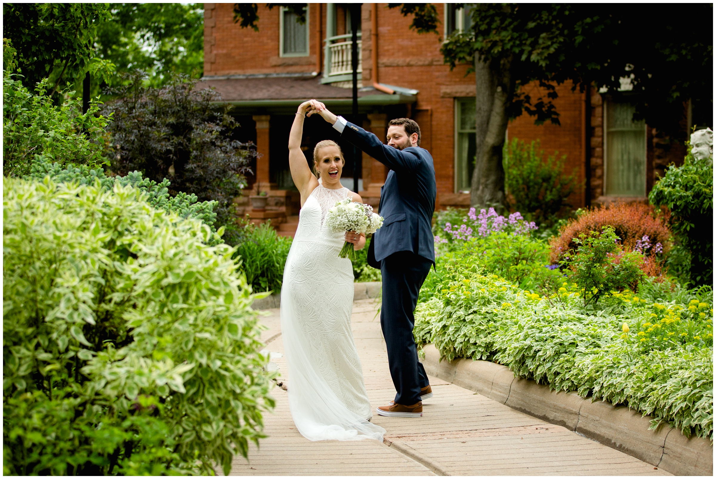 bride and groom dancing in gardens at Colorado summer wedding