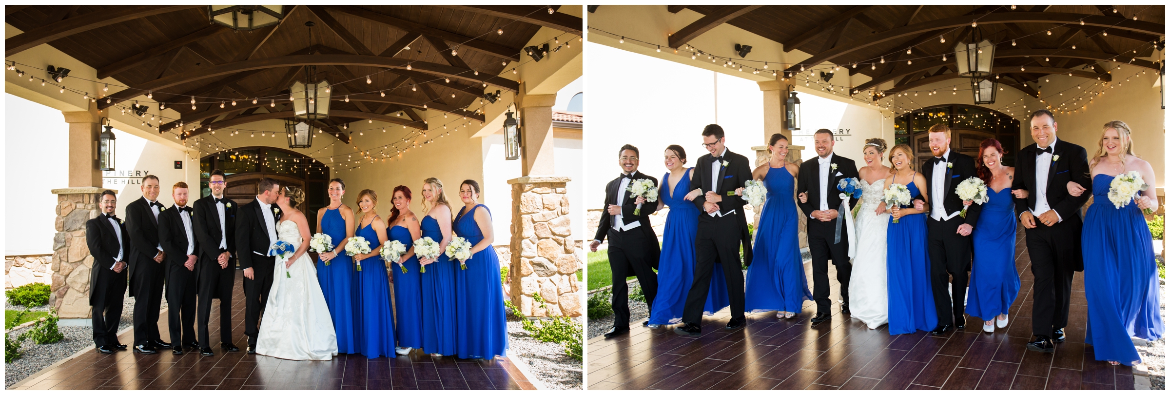 wedding party in royal blue and black posing in front of wooden doors at pinery on the hill 
