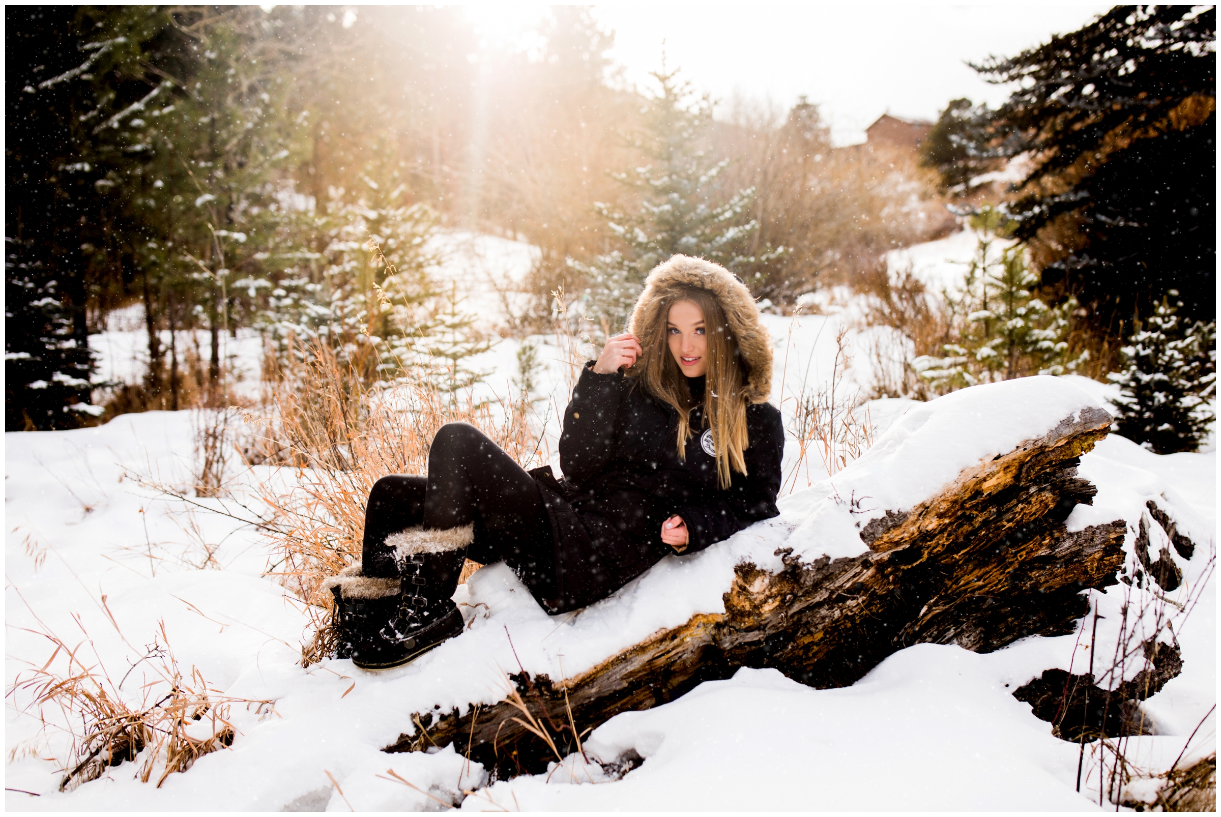 teen girl posing in the snow during winter senior photography session at YMCA of the Rockies Estes Park 