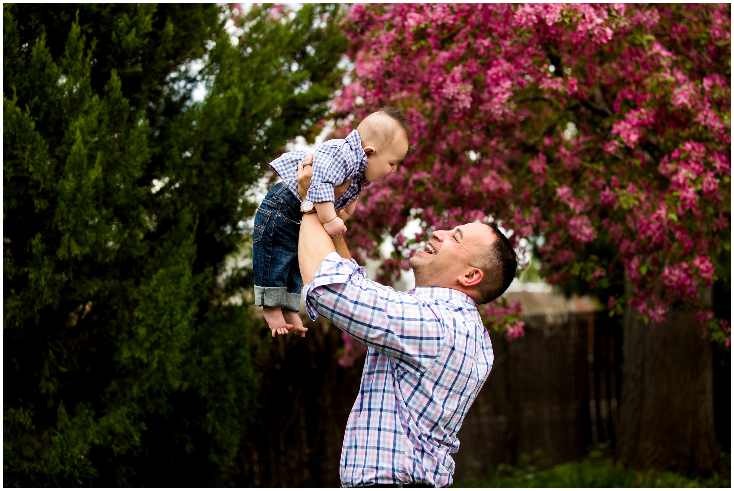 dad lifting baby into the air during Longmont family pictures at Callahan House