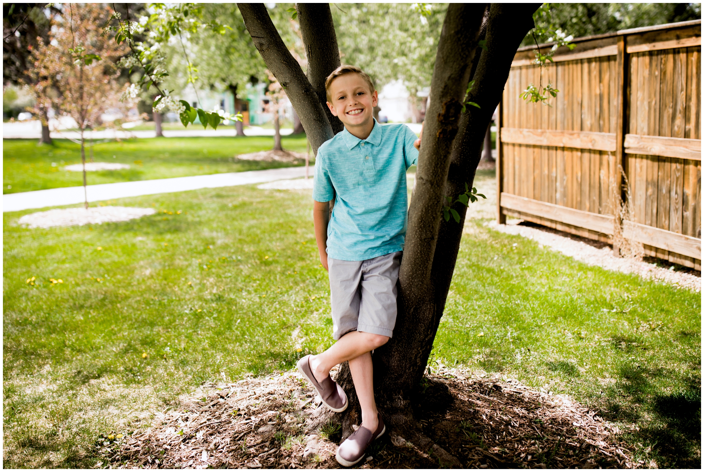 young boy posing by a tree at Roosevelt Park Colorado 