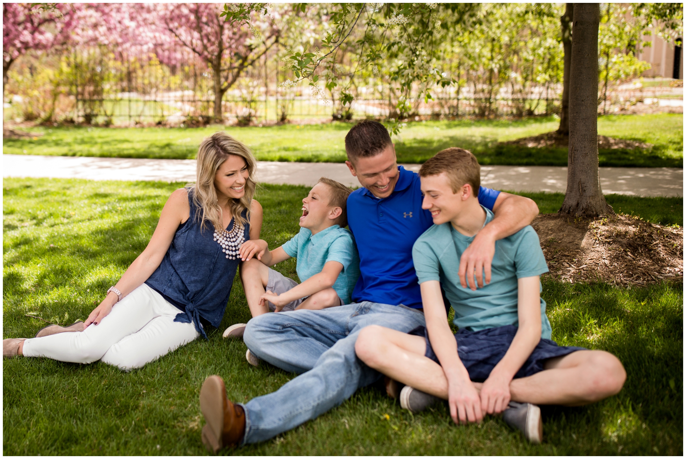 Longmont CO family portraits at Roosevelt Park with cherry blossoms by Colorado photographer Plum Pretty Photography