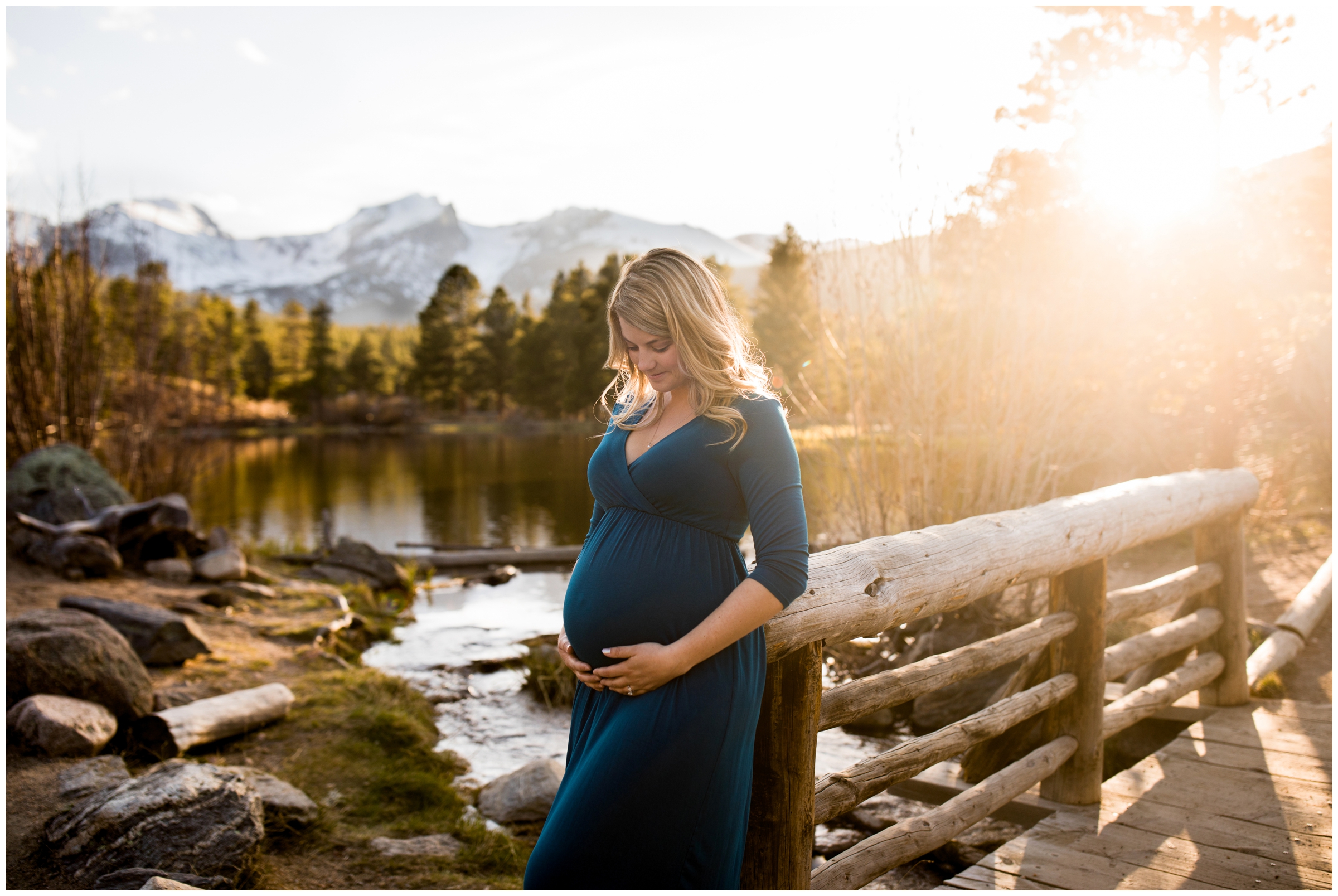 woman leaning against bridge with mountains in background during Colorado pregnancy photos by maternity photographer Plum pretty Photography 