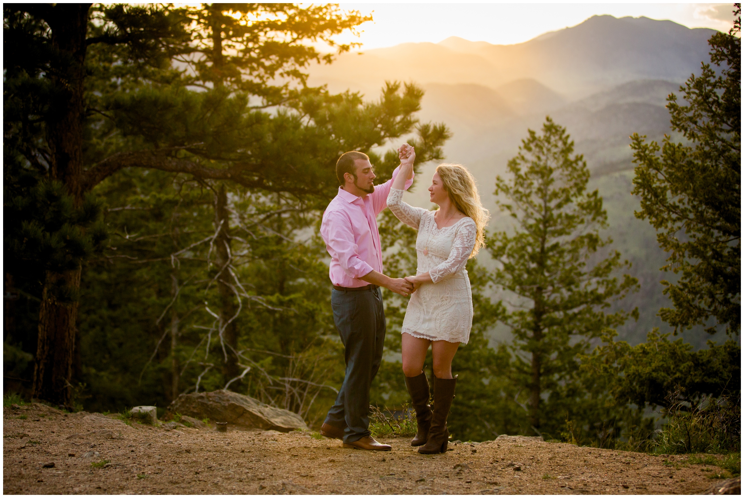 couple dancing with mountains in background during Colorado summer engagement photos by Golden photographer Plum Pretty Photography 