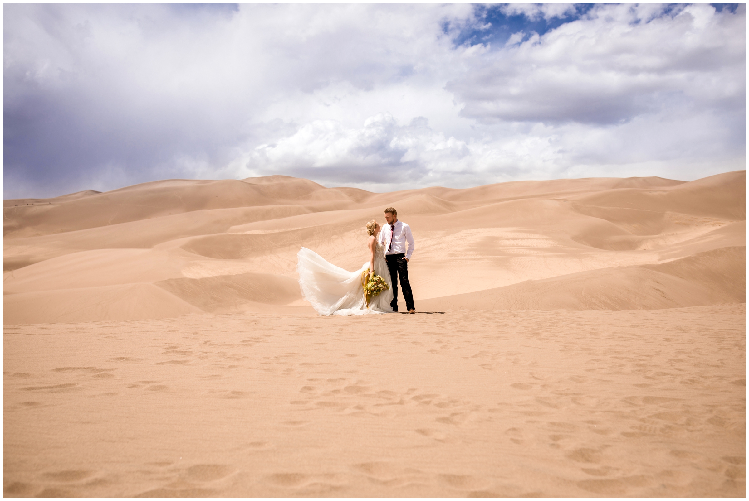 wedding dress flying in the wind during Colorado elopement wedding 