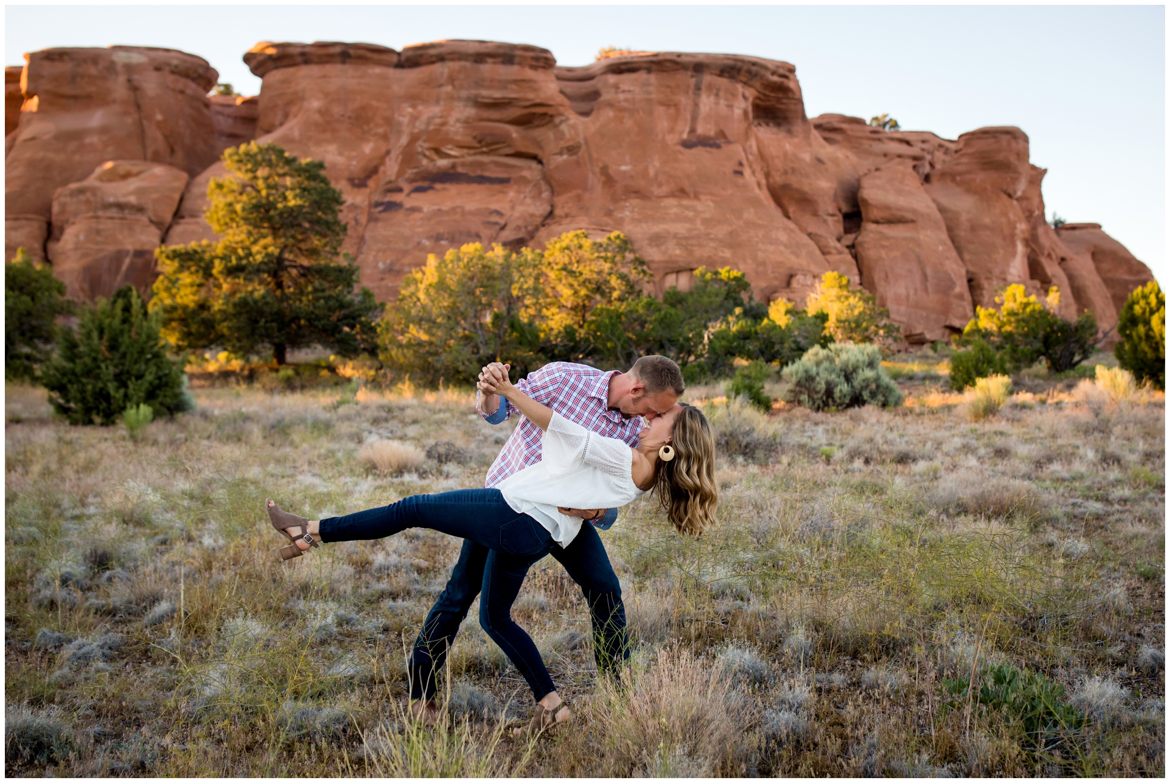 couple dipping during Grand Junction Colorado engagement photos 