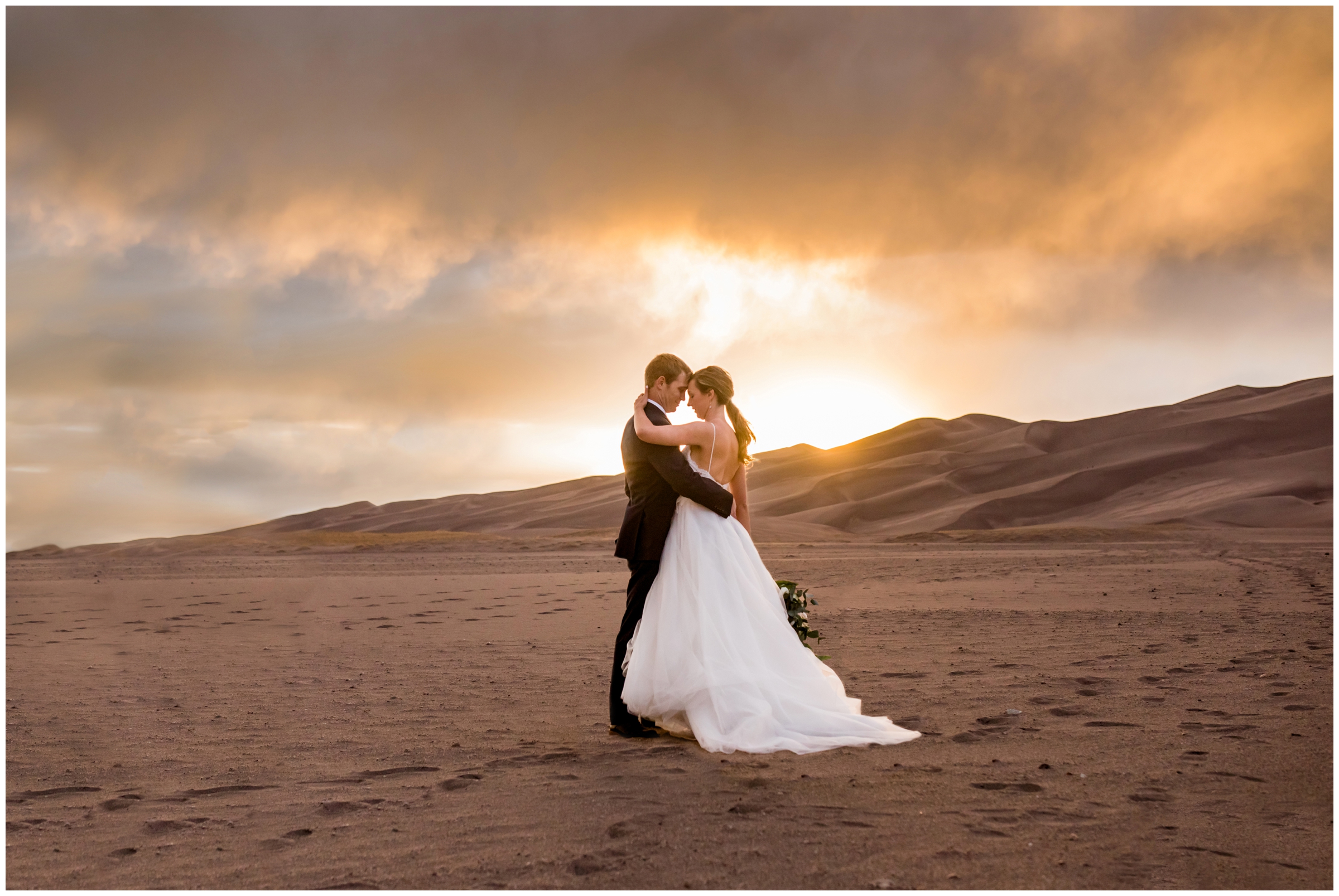 Sand Dunes Colorado wedding photos at sunset with dramatic skies 