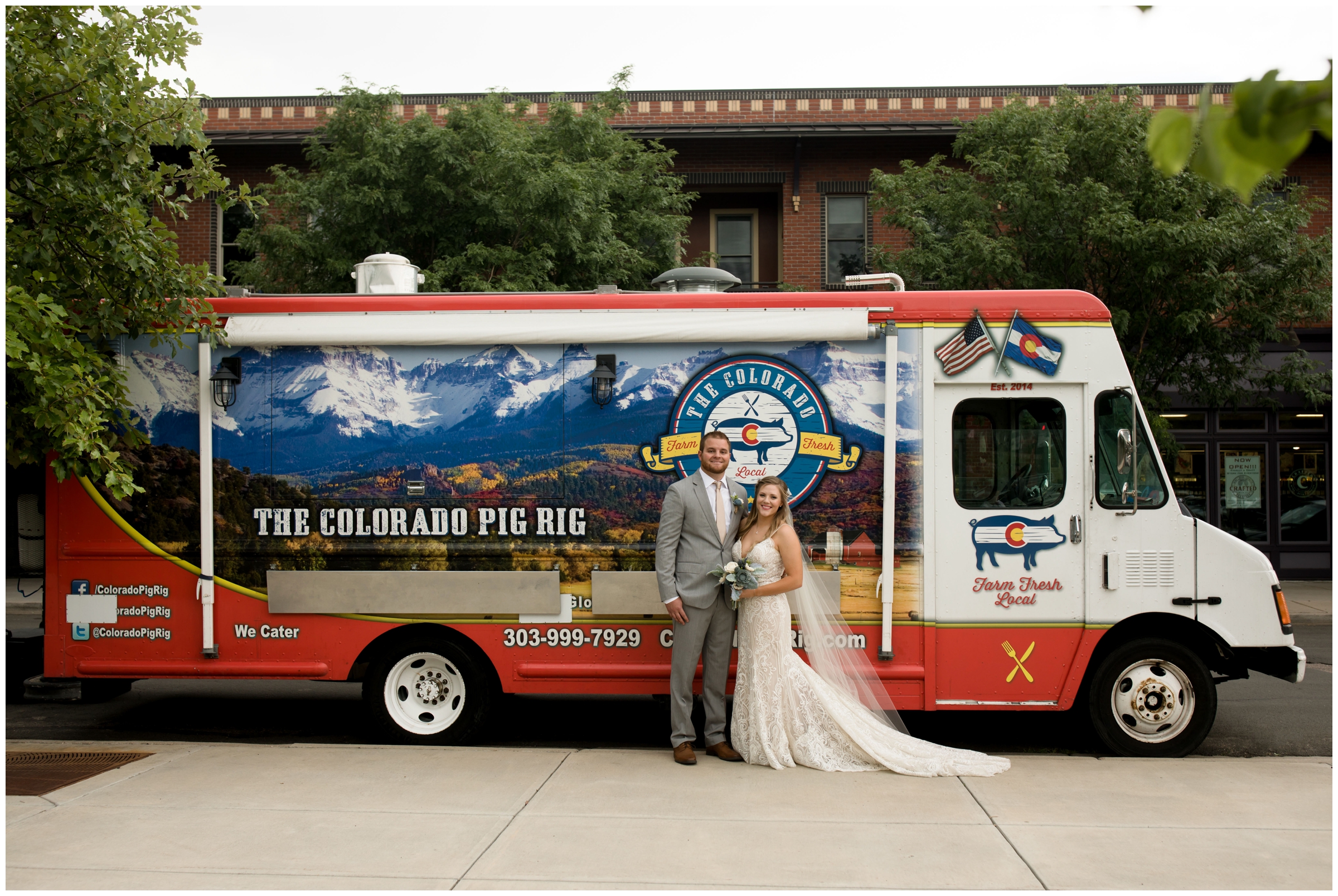 couple posing in front of food truck at Colorado wedding 