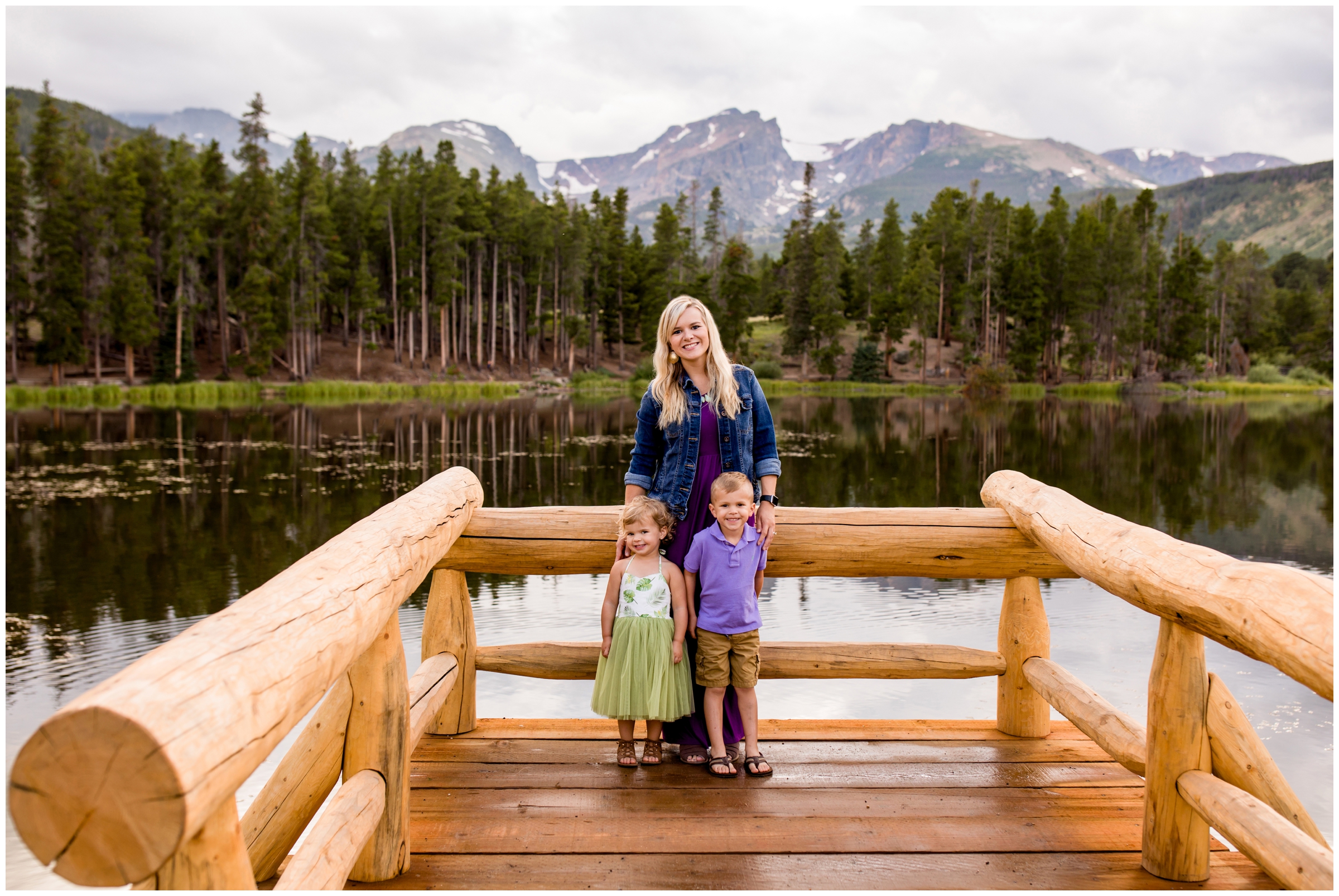 mom and kids posing on dock during Colorado lake family photos 