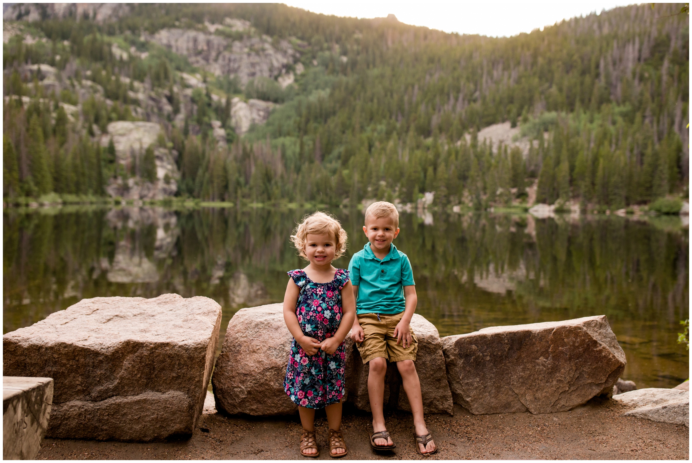 kids posing with mountains in background during Bear Lake Colorado family pictures 