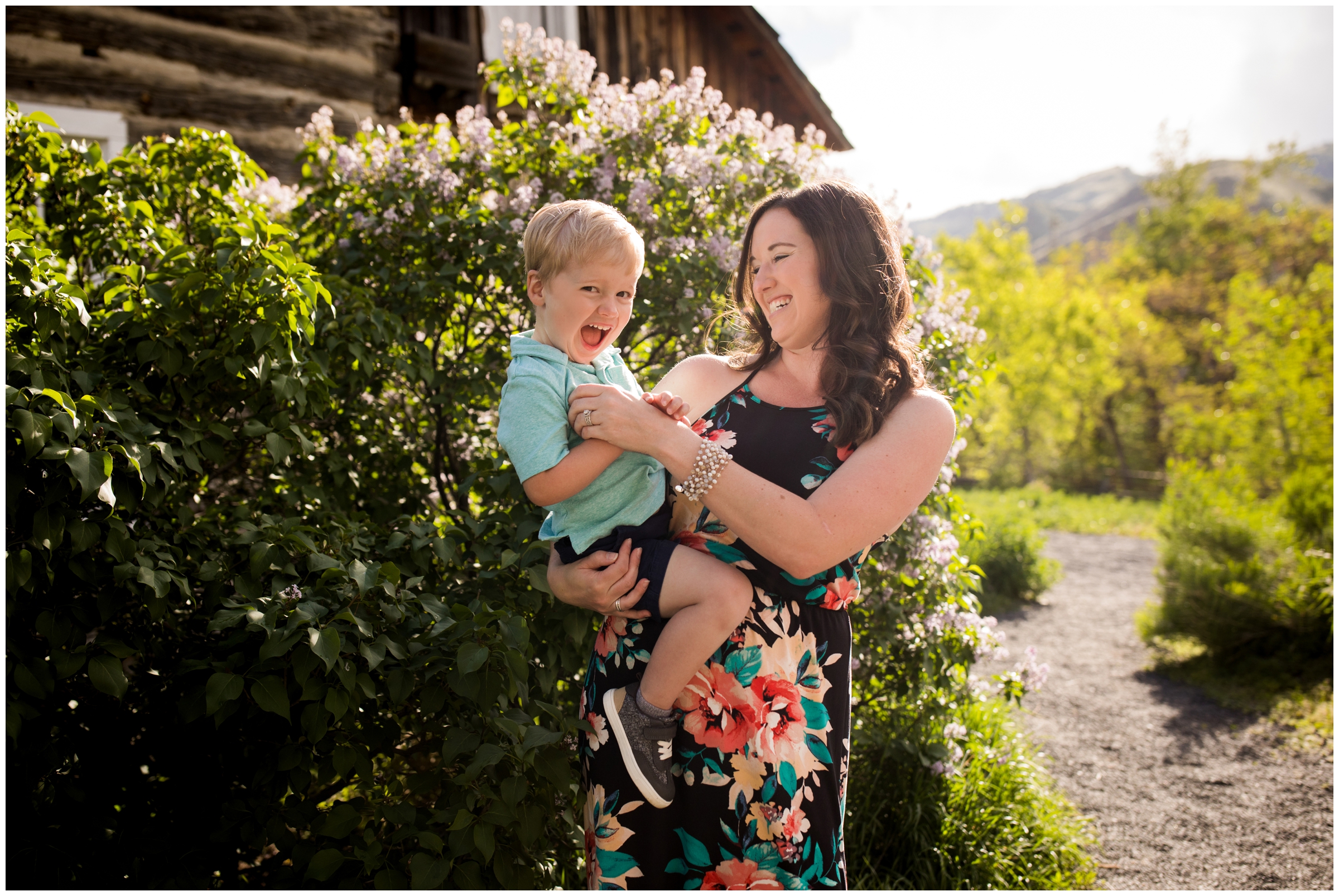 mom tickling son during Golden Colorado family photography session 