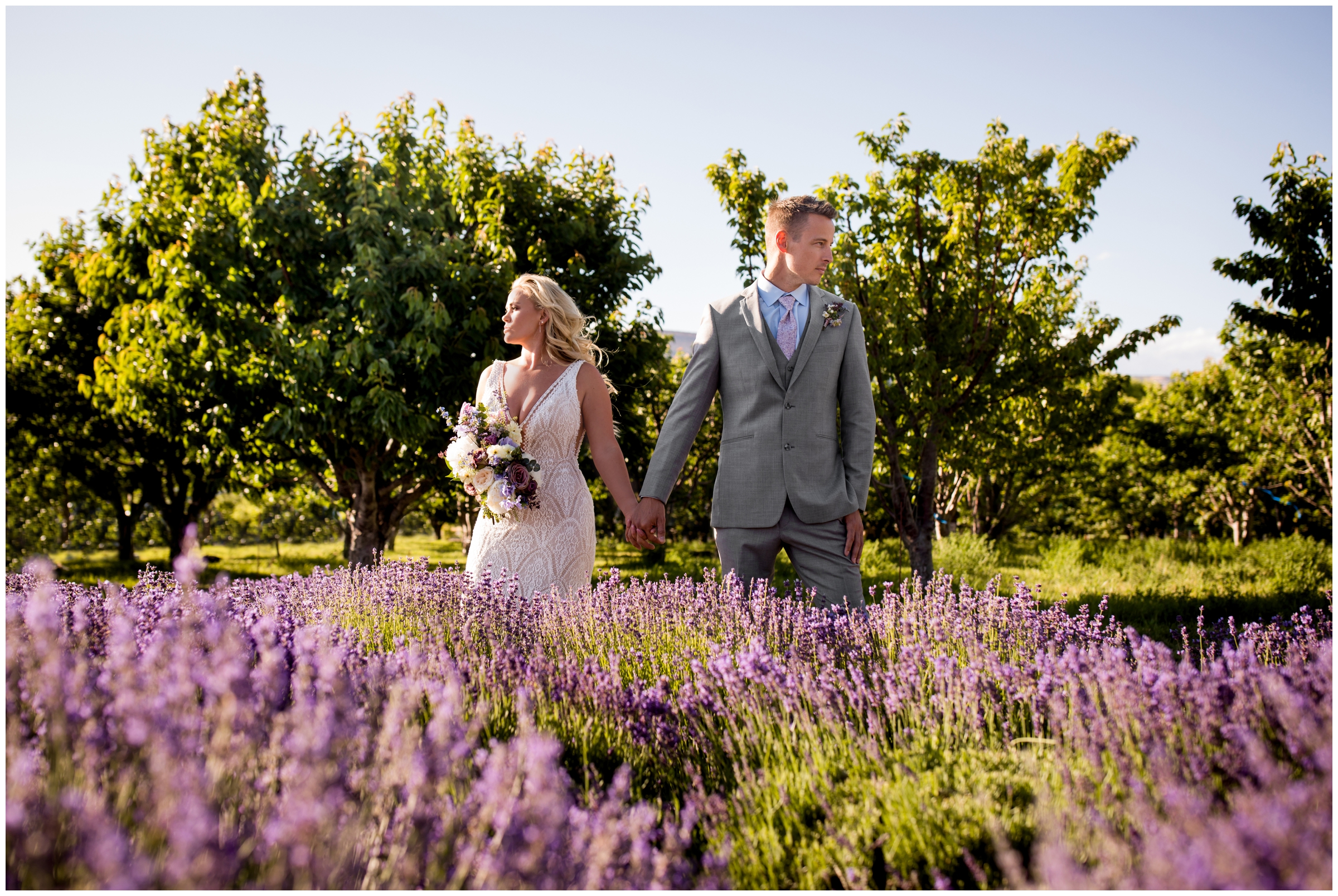 couple posing in flower field during Colorado summer wedding photos 