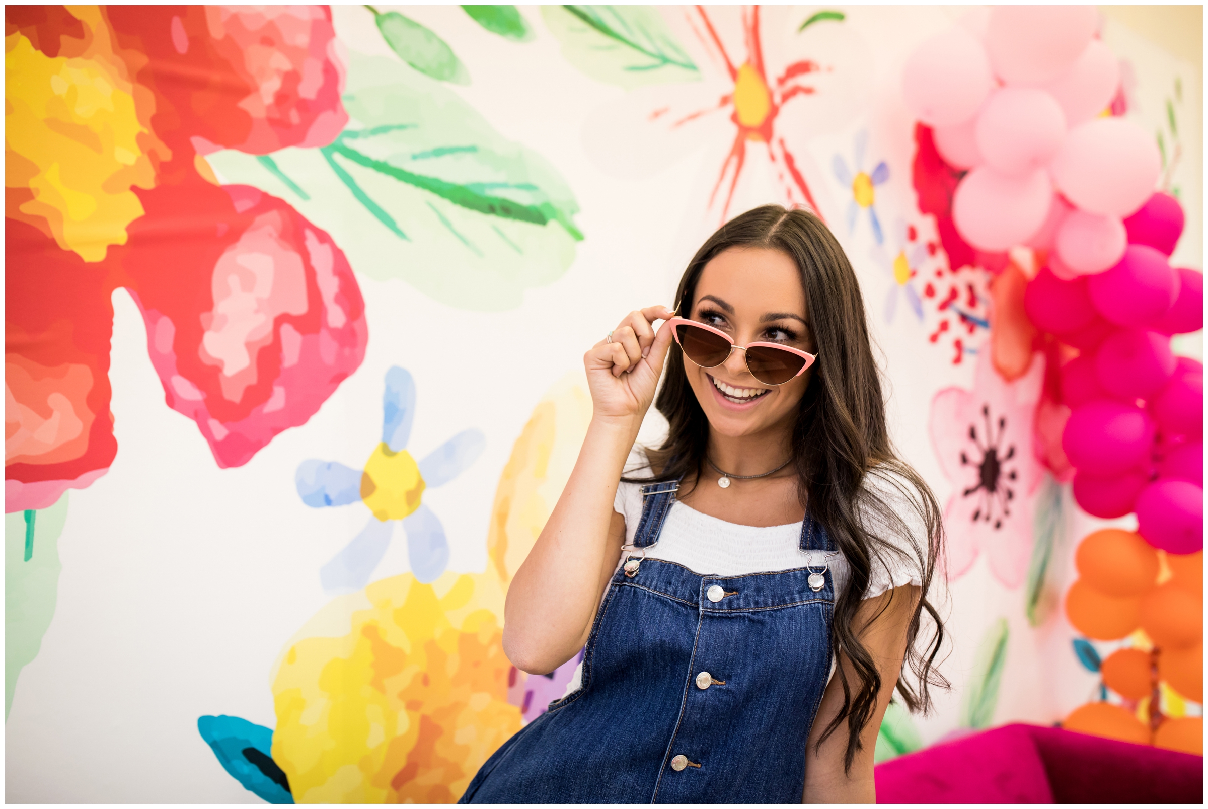 teen girl posing in sunglasses during Colorado senior pictures 