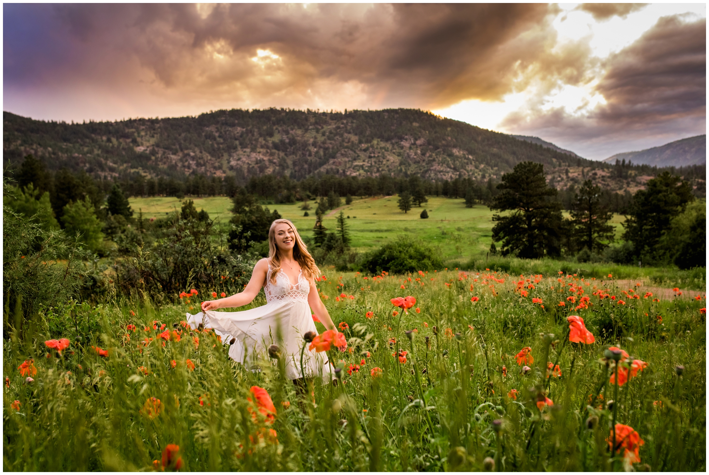 teen girl twirling in flower field during Colorado mountain senior pictures 